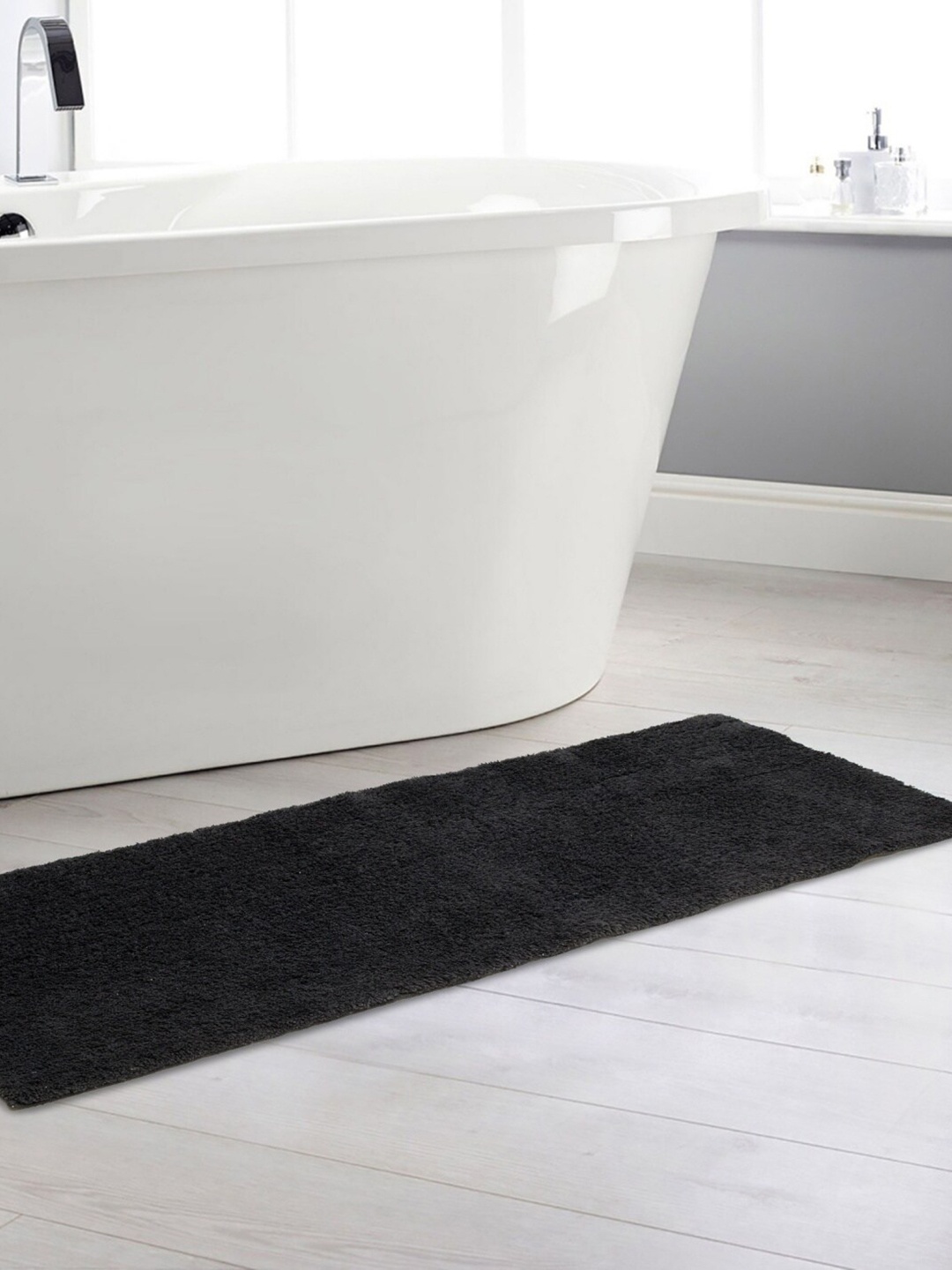 

Home Centre Grey Solid Bath Rug