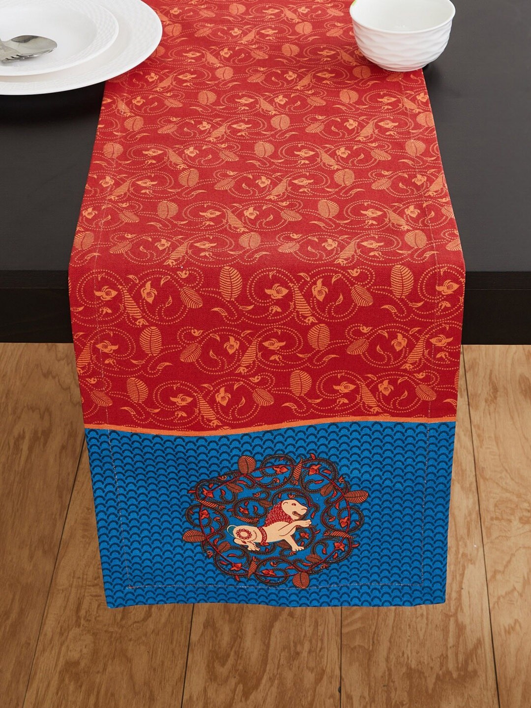 

Home Centre Red & Blue Coromandal Printed Cotton Table Runner