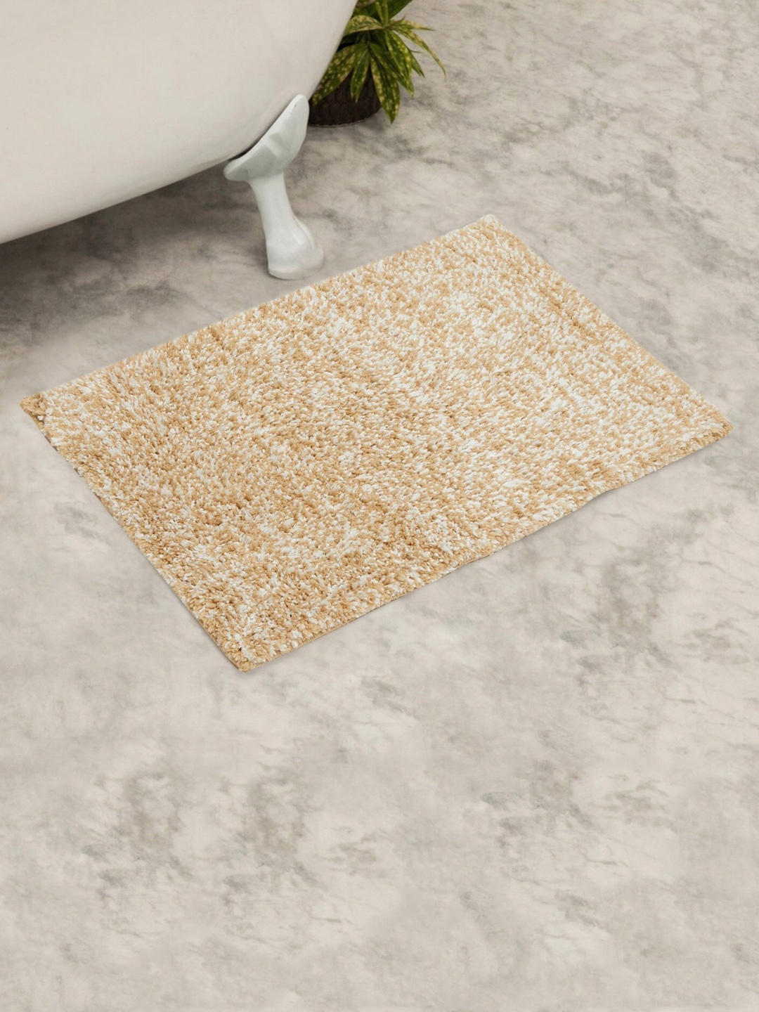 

Home Centre Beige & White Solid Rectangular Bath Rug