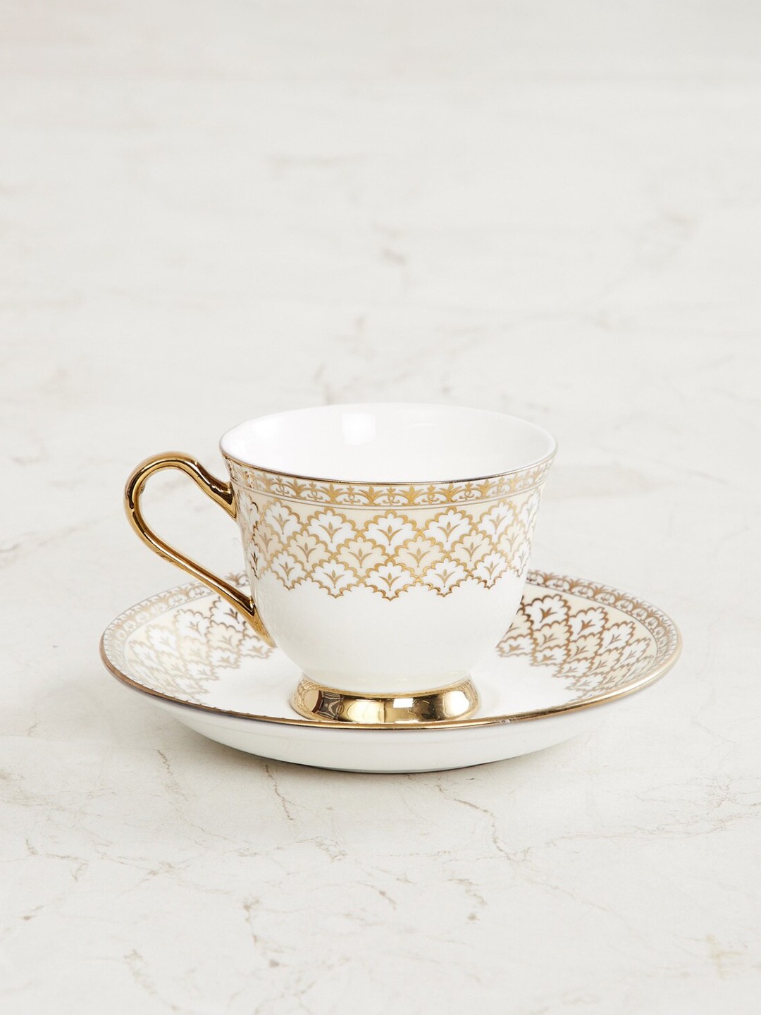 

Home Centre White & Gold-Toned Printed Bone China Fiesta Ebony Cup and Saucer Set