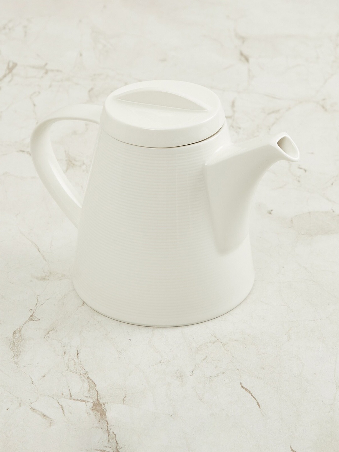 

Home Centre White Solid Porcelain Kettle 1 L