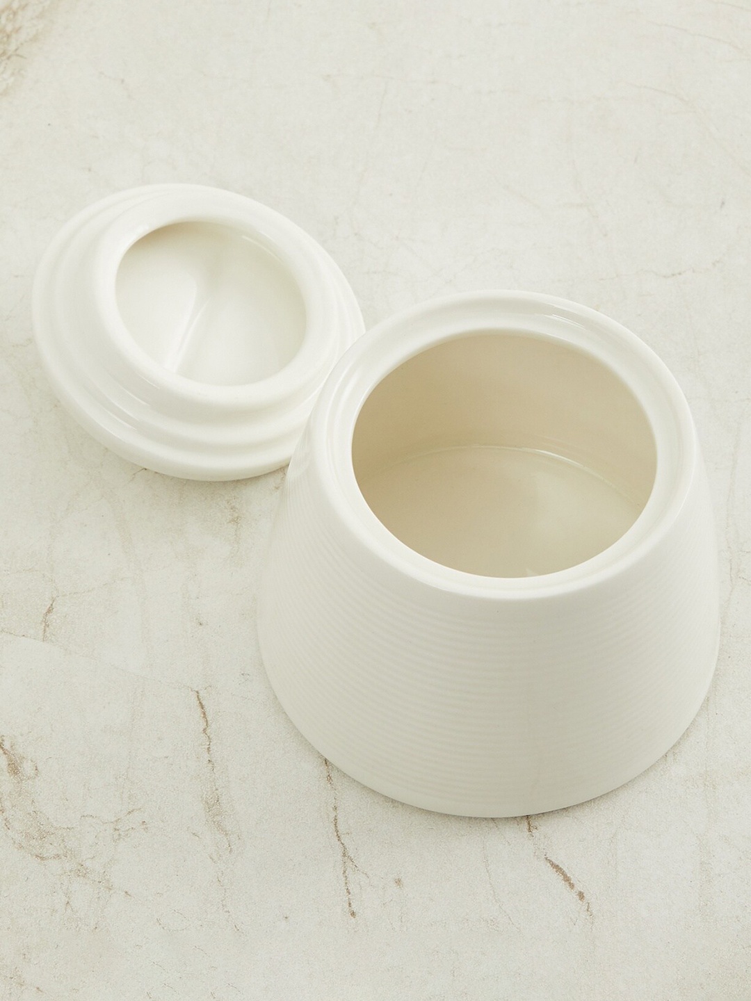 

Home Centre White Solid Porcelain Marshmallow Textured Sugar Pot