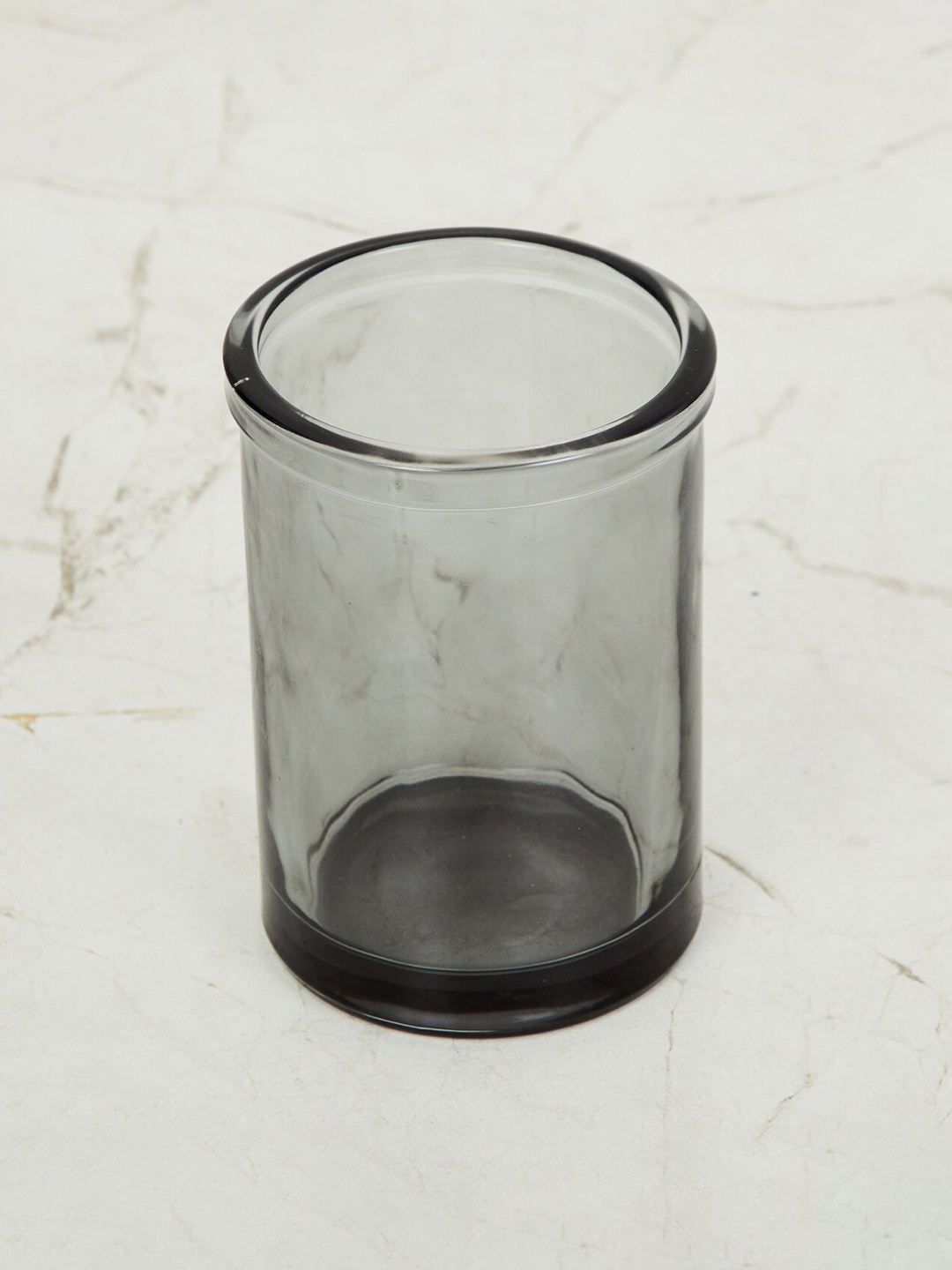 

Home Centre Grey Solid Glass Toothbrush Holder
