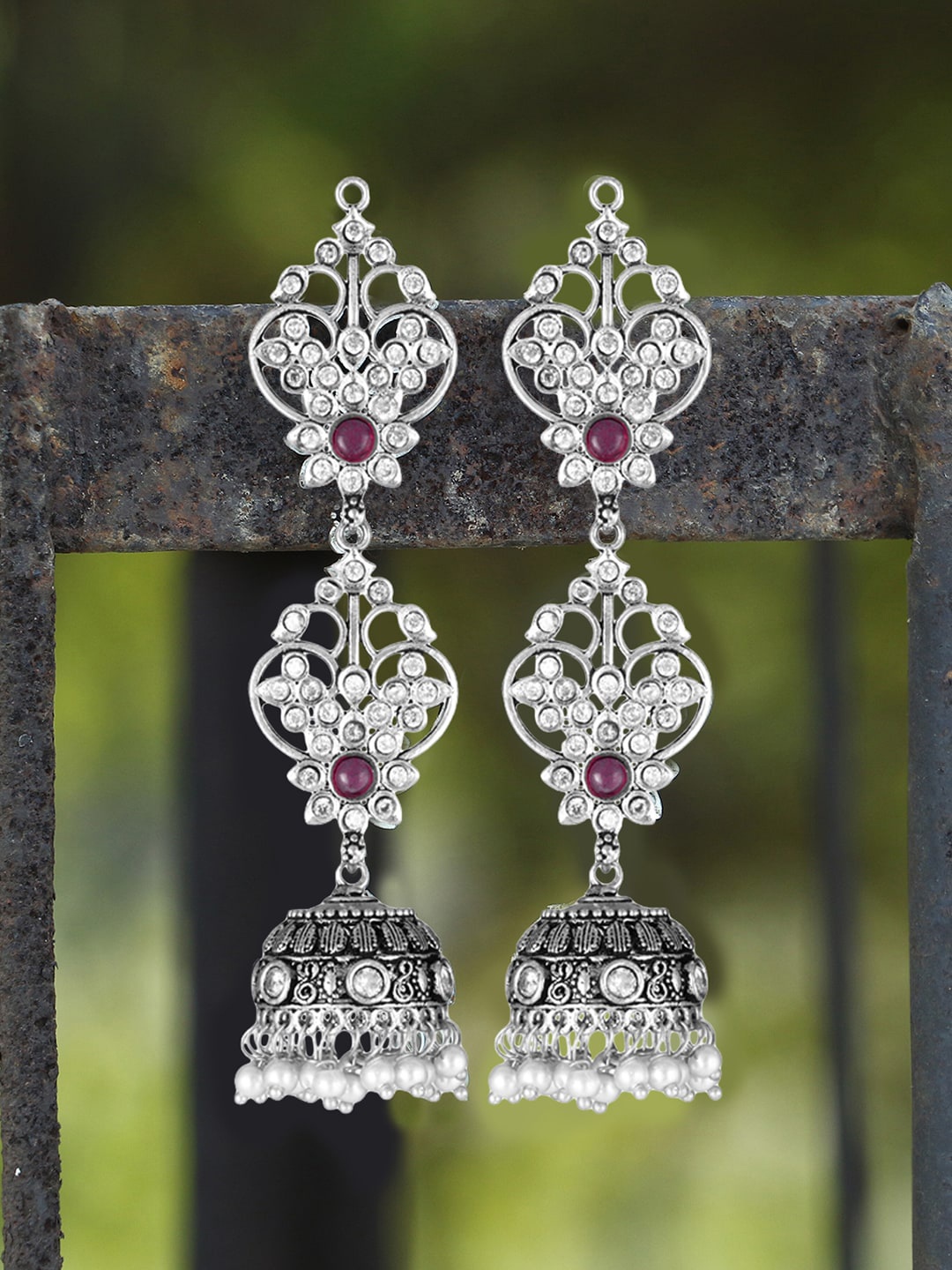 

Adwitiya Collection Silver-Toned Contemporary Jhumkas