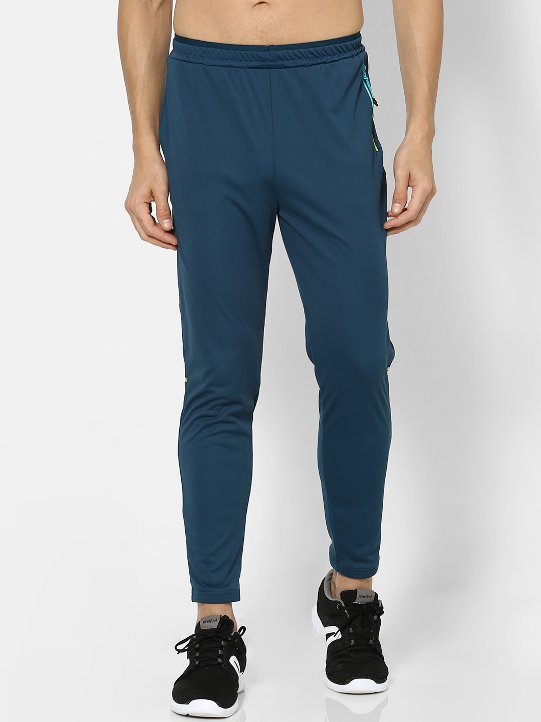 

FLX By Decathlon Men Turquoise Tapered Fit Quick Dry Cricket Track Pants, Teal