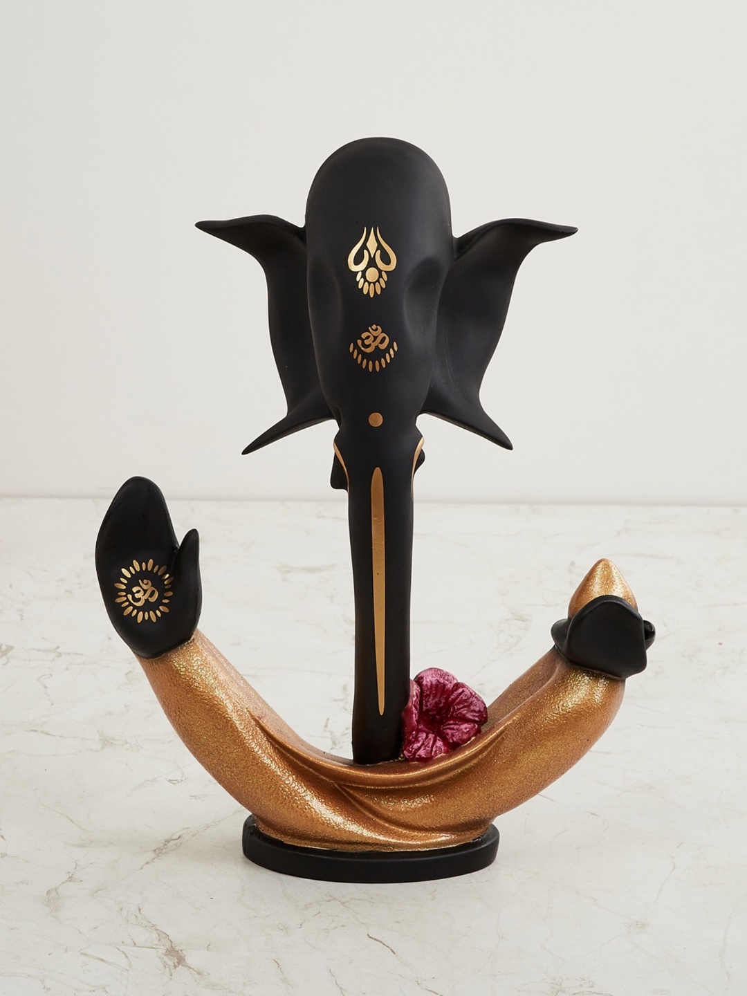 

Home Centre Gold-Toned & Black Ganesha Idol Showpiece