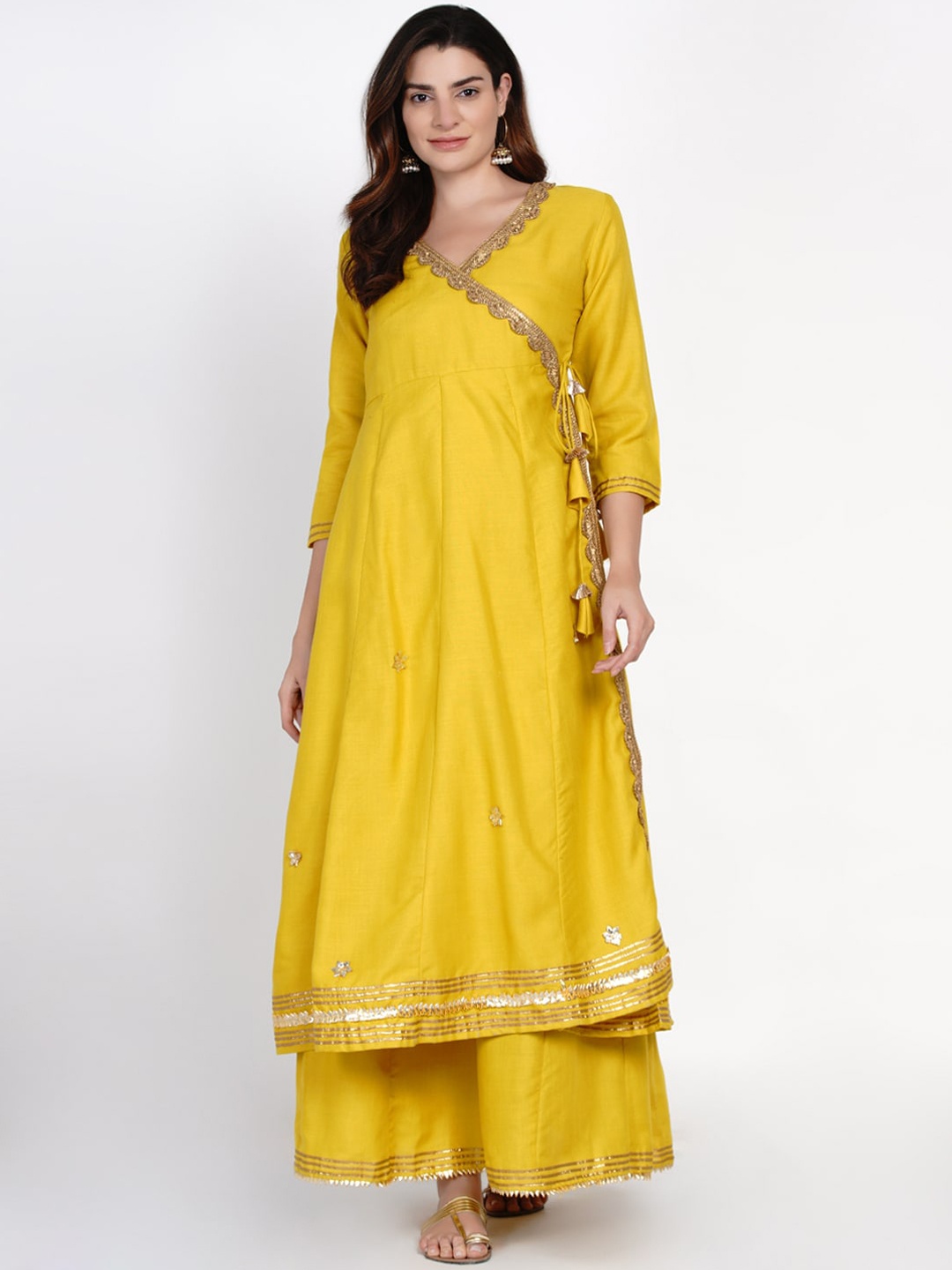 

Bhama Couture Women Mustard Yellow Floral Angrakha Kurta with Skirt