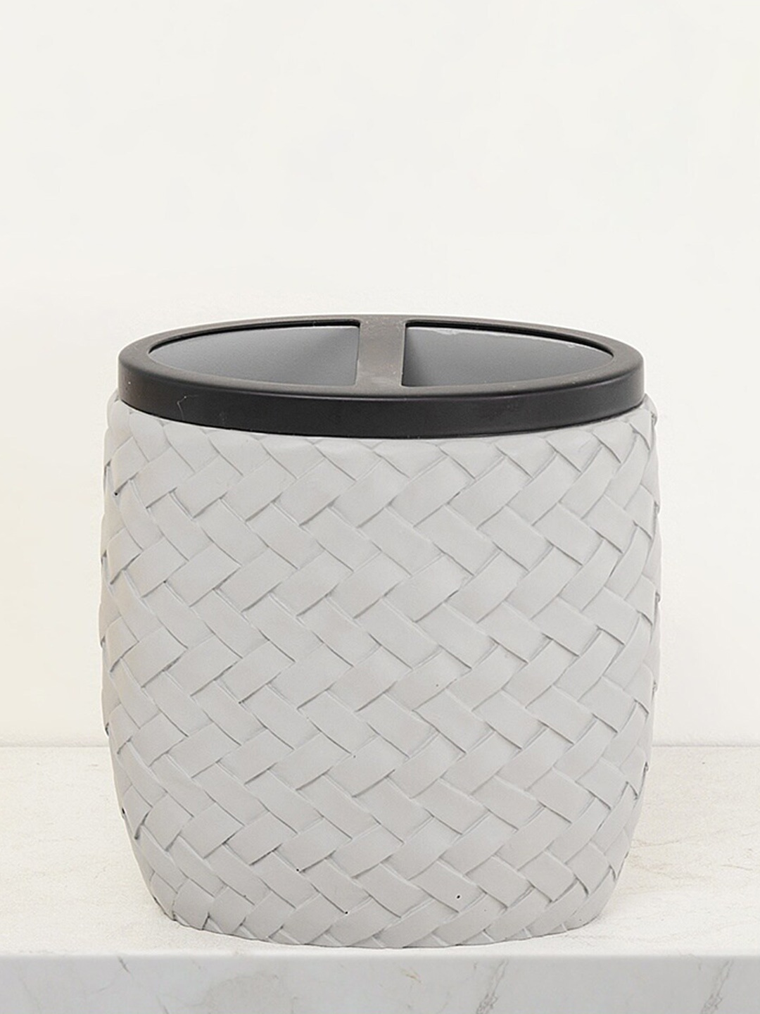 

Home Centre Grey & Black Textured Marshmallow Toothbrush Holder