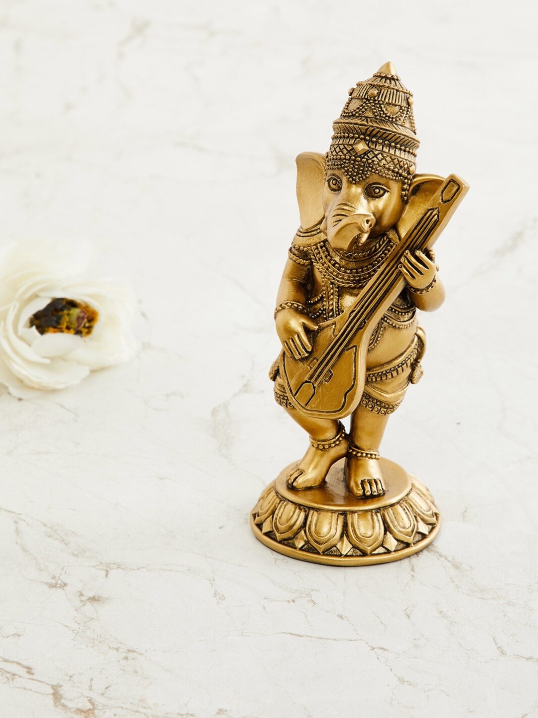 

Home Centre Gold-Toned Ganesha With Sitar Ceramic Figurine Showpiece