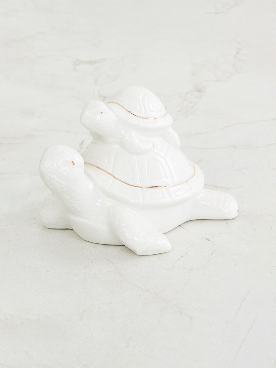 

Home Centre White Brighton Ceramic Turtle Pair Figurine Showpiece
