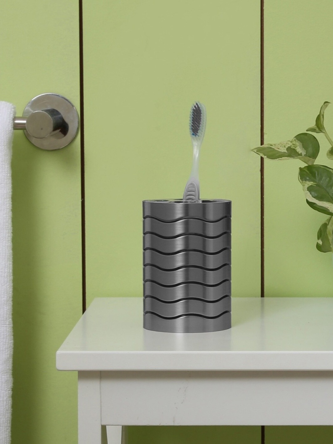 

Home Centre Silver-Toned Striped Hudson Silvia Toothbrush Holder