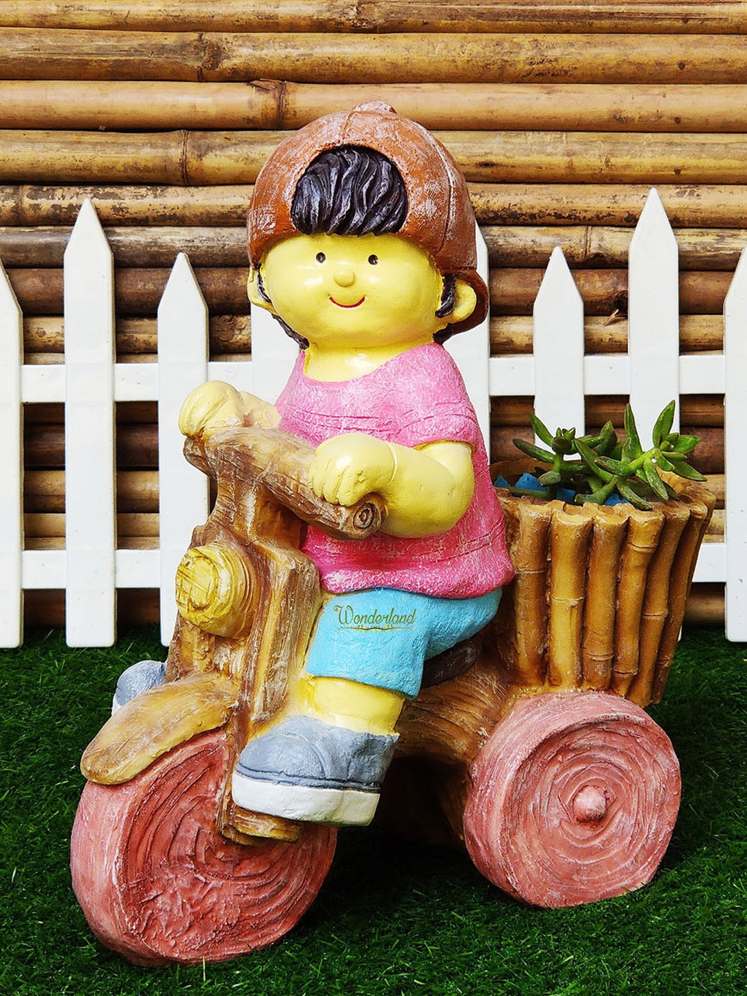 

Wonderland Pink & Beige Boy On Cycle Planter