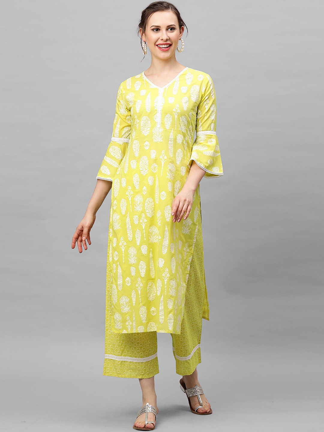 

Indo Era Women Yellow & White Printed Kurta with Palazzos