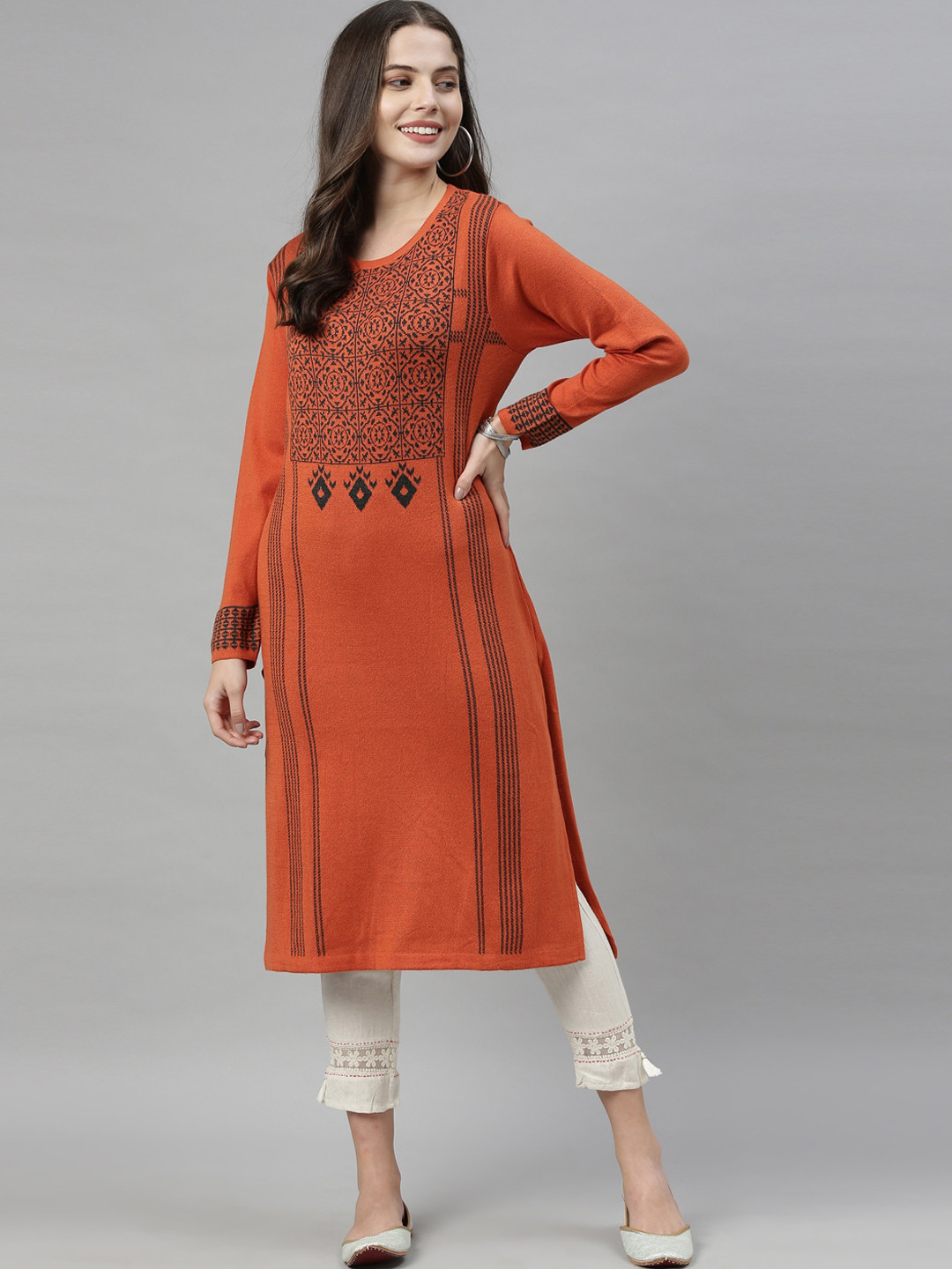 

Neerus Women Rust Orange & Black Ethnic Motifs Printed Acrylic Knitted Kurta