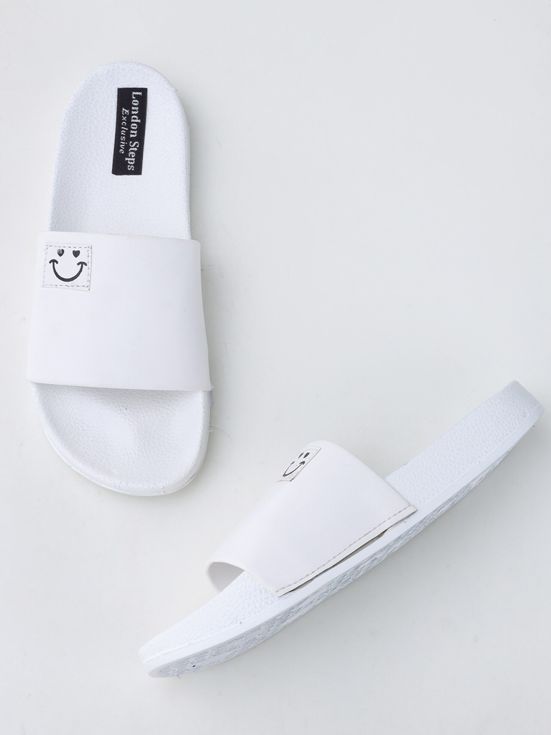 

LONDON STEPS Men White Solid Sliders