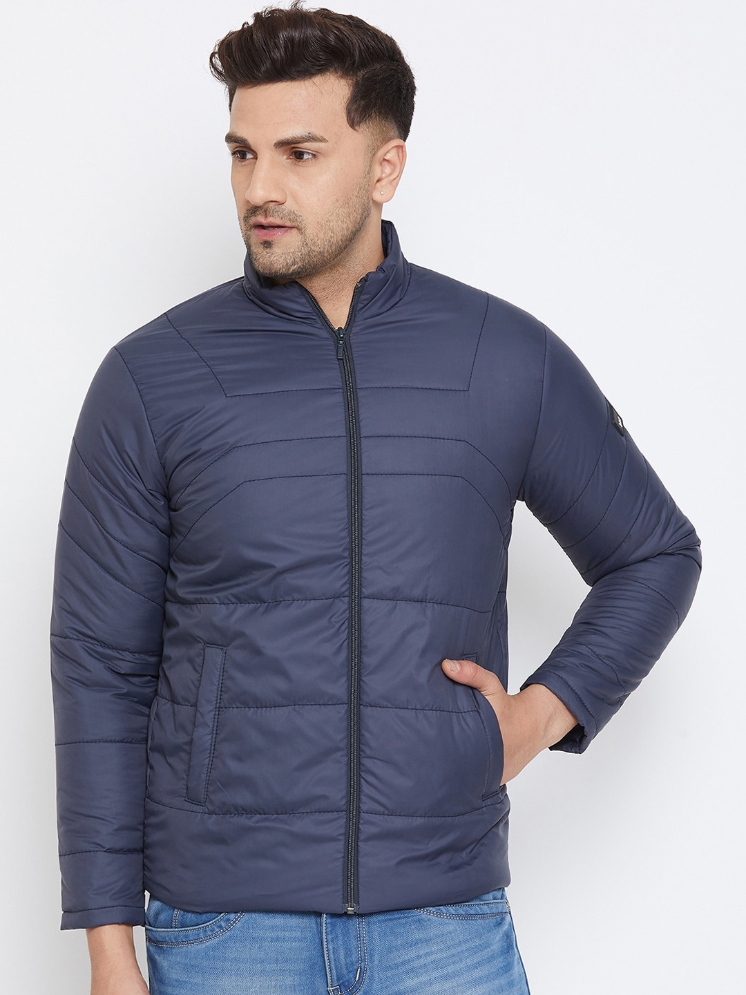 

Spirit Men Navy Blue Solid Windcheater Padded Jacket
