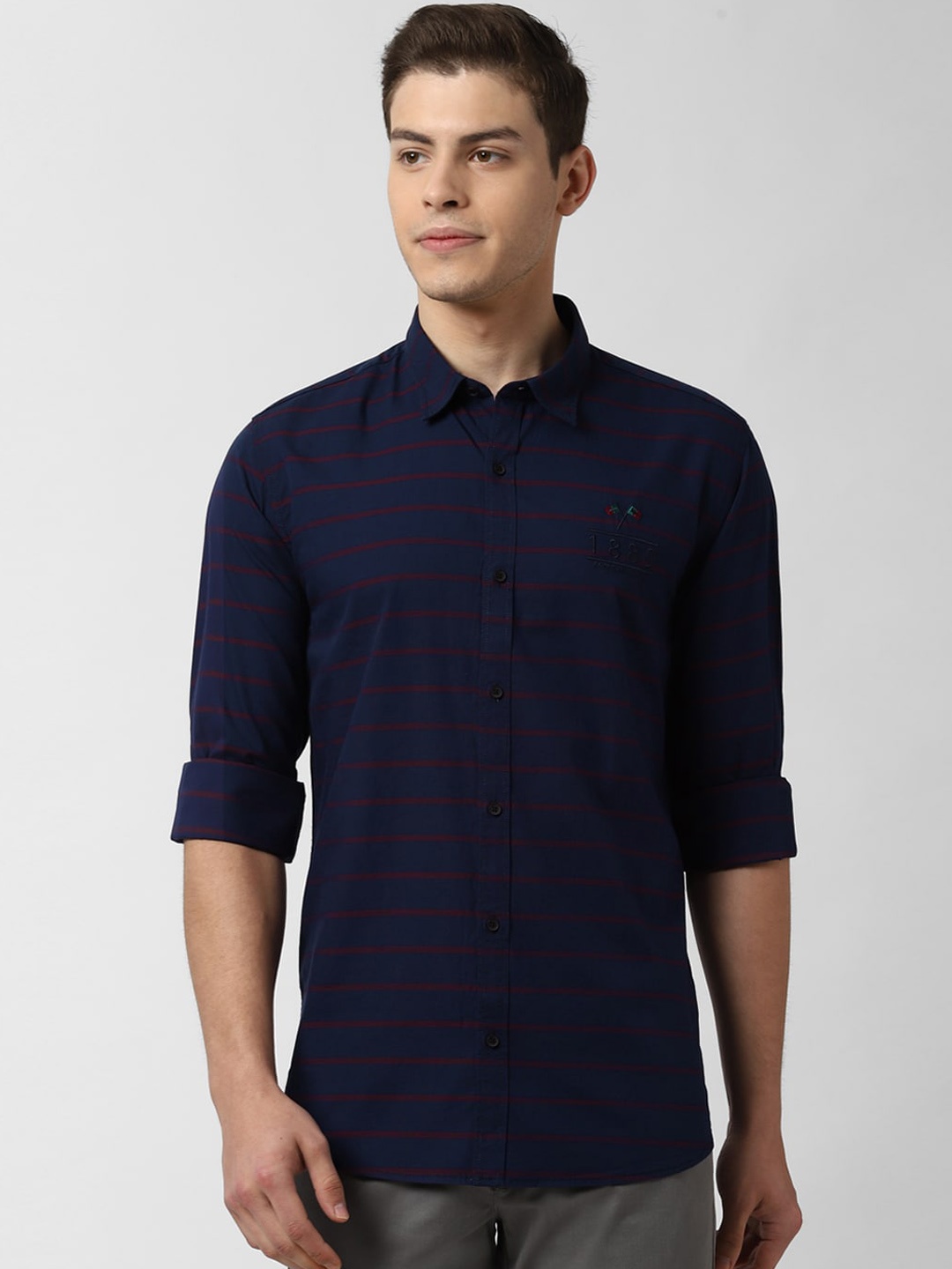 

Peter England Casuals Men Navy Blue & Red Slim Fit Striped Casual Shirt
