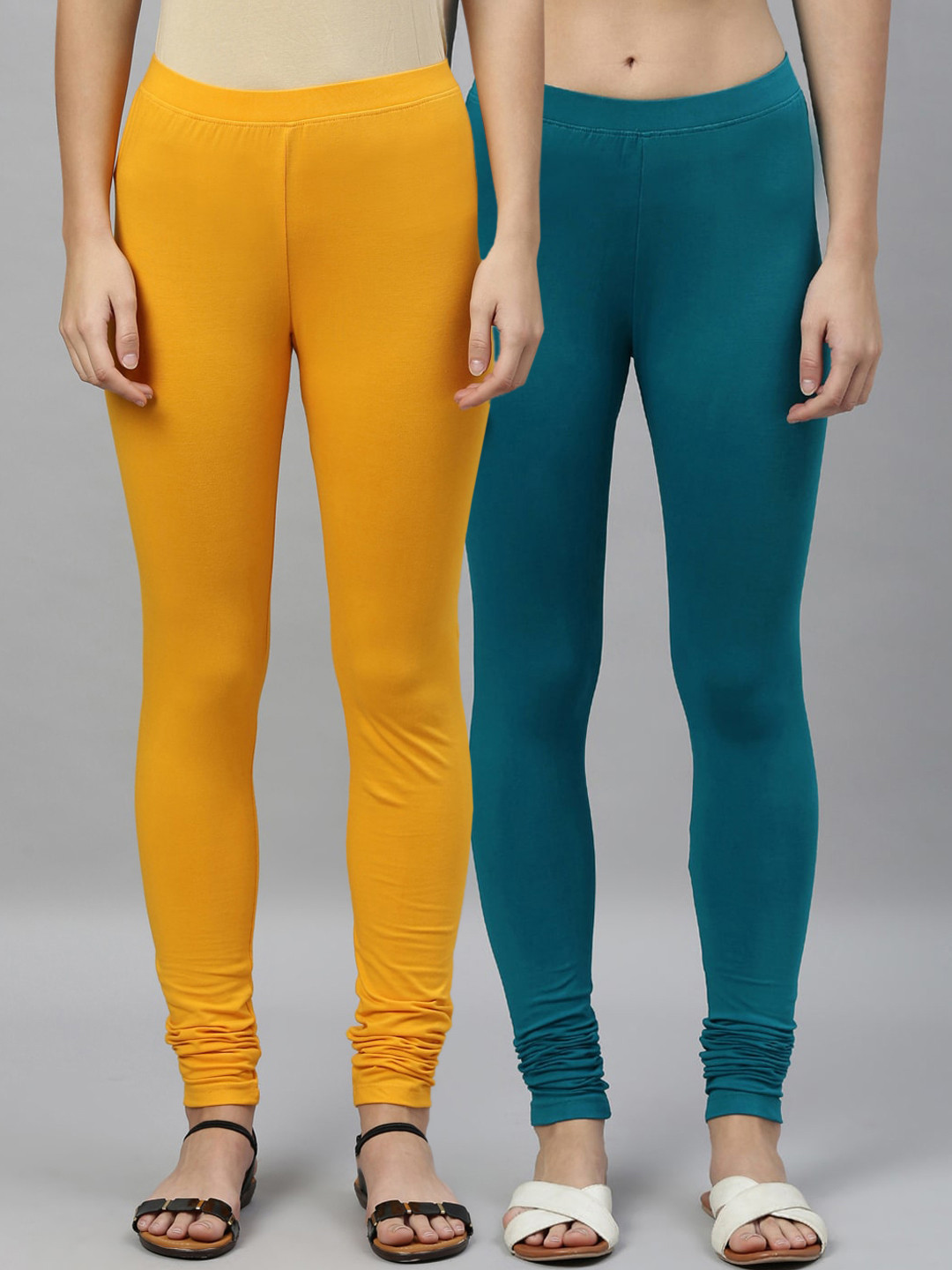 

Kryptic Women Pack of 2 Solid Churidar-Length Leggings, Mustard