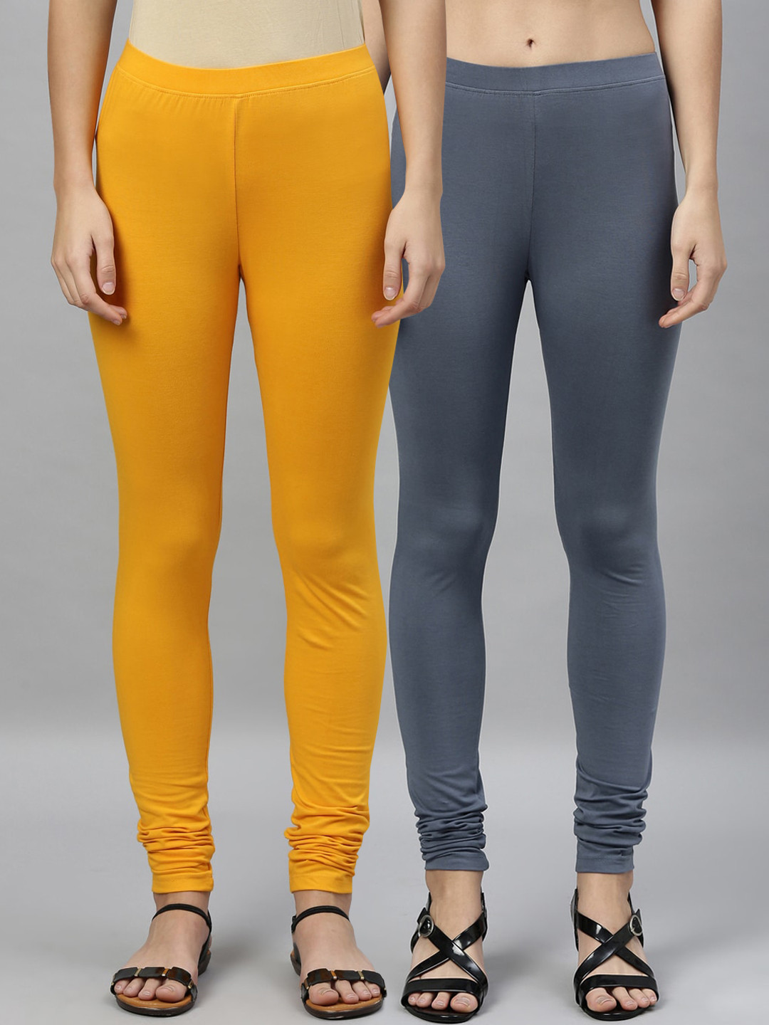 

Kryptic Women Pack of 2 Solid Churidar-Length Leggings, Mustard