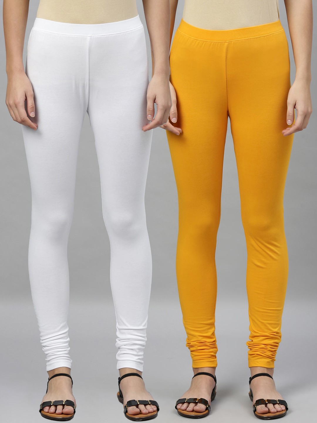 

Kryptic Women Pack of 2 Solid Churidar-Length Leggings, Mustard