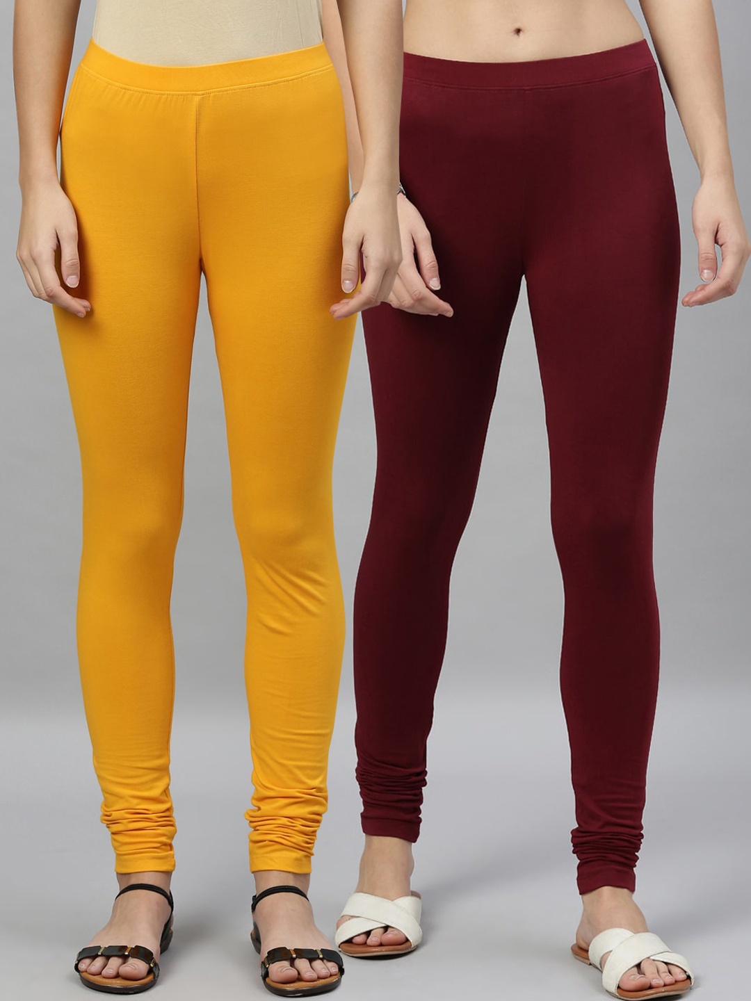 

Kryptic Women Pack of 2 Solid Churidar-Length Leggings, Mustard