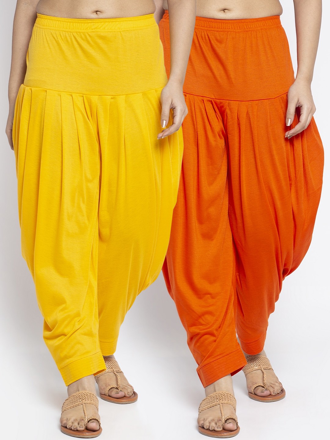 

GRACIT Women Pack Of 2 Yellow & Orange Solid Salwars