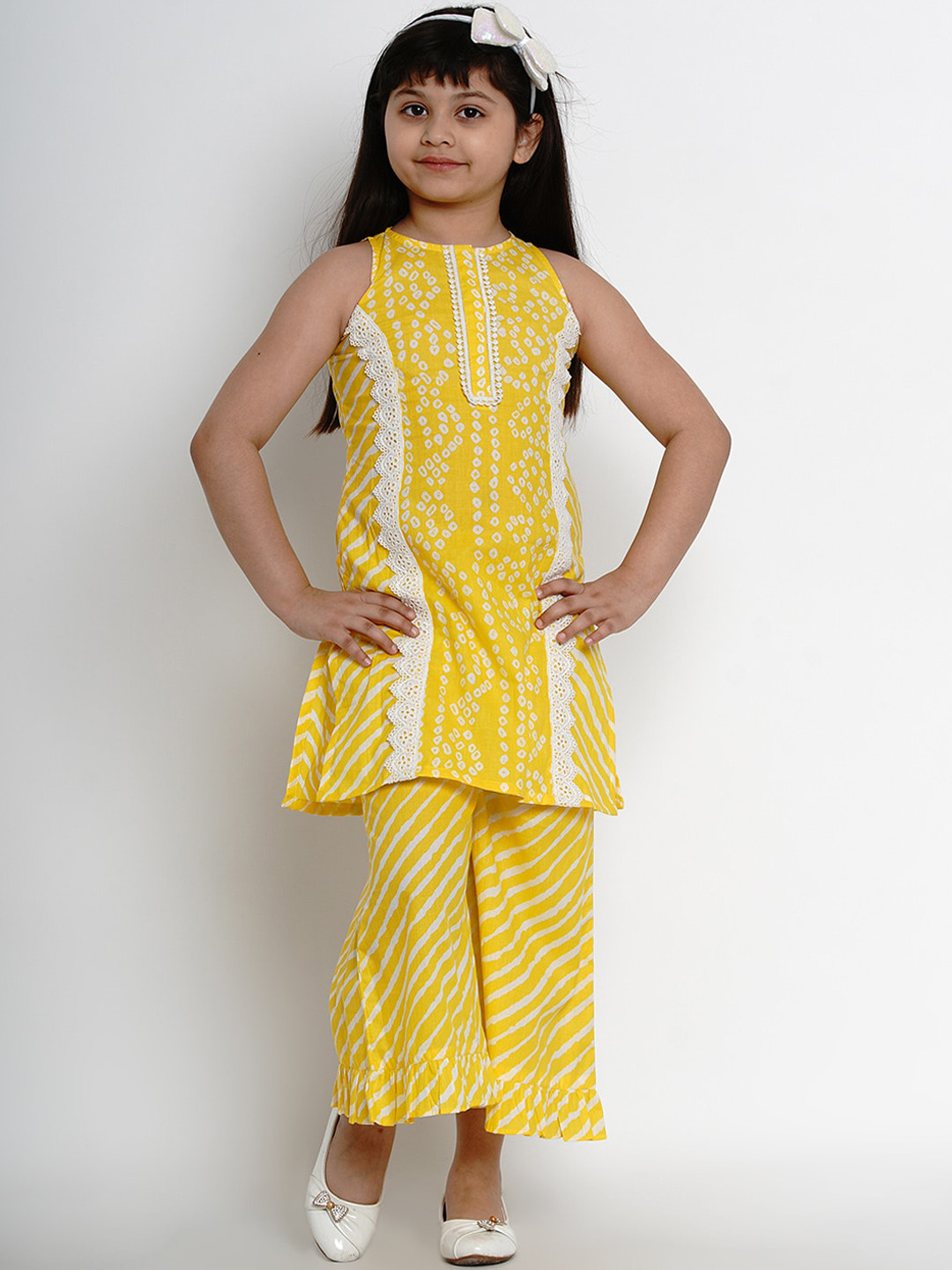 

Bitiya by Bhama Girls Yellow & White Bandhani Printed Pure Cotton Kurti with Palazzos