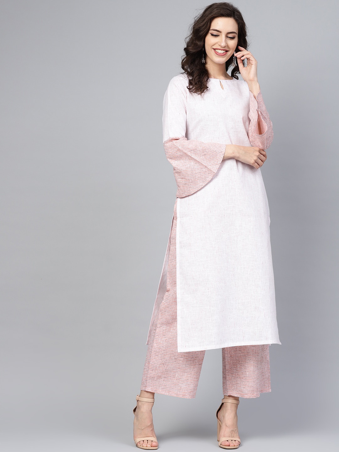 

Libas Women Pink & White Striped Pure Cotton Kurta with Palazzos