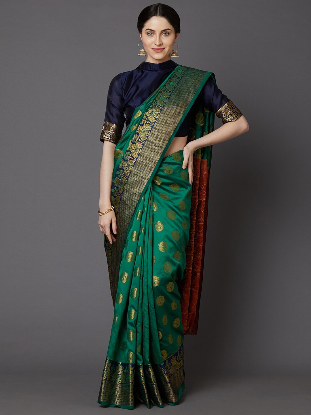 

Saree mall Green & Gold Toned Woven Design Zari Silk Blend Banarasi Sarees