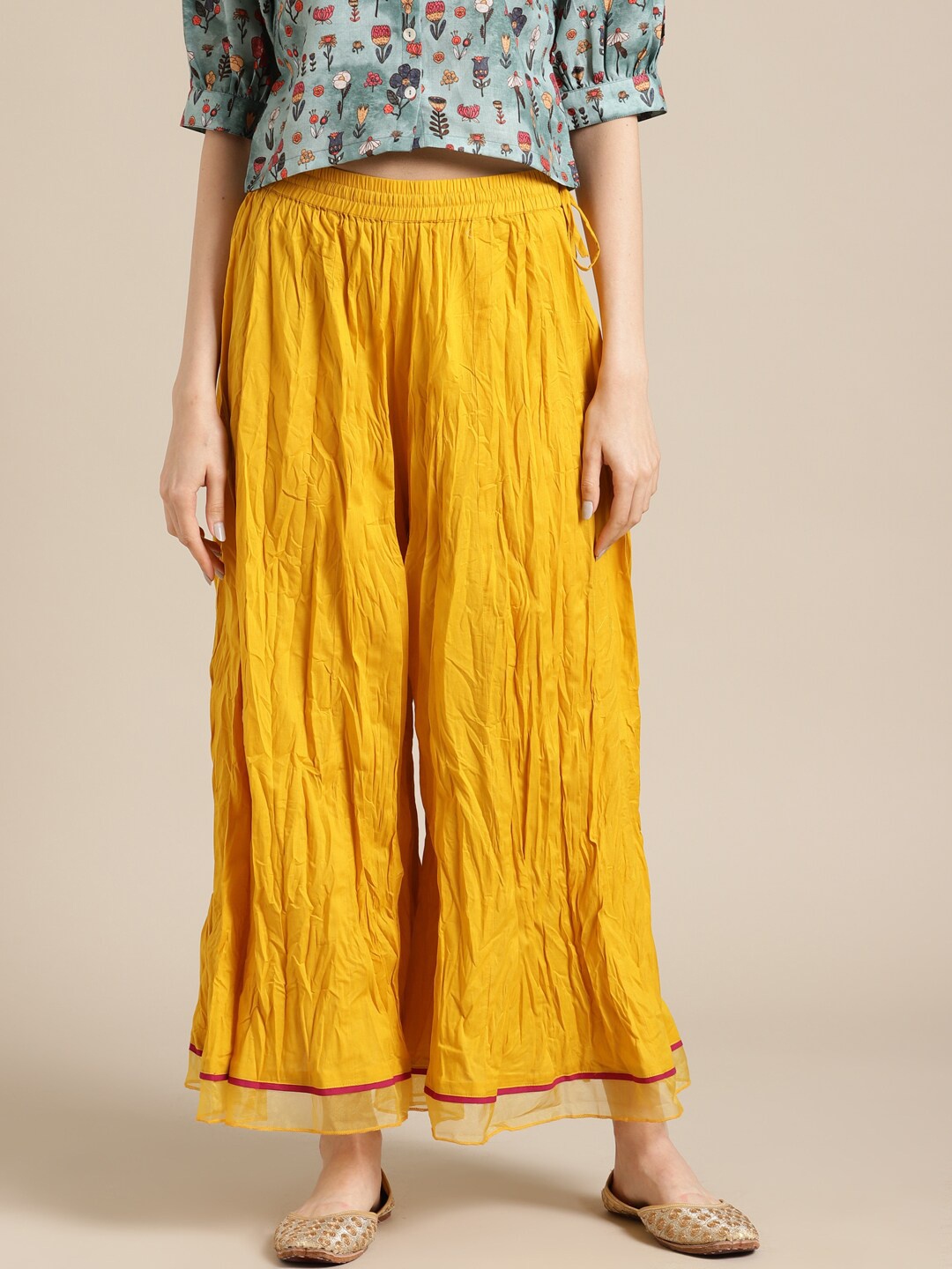

Varanga Women Mustard Yellow Flared Cotton Ethnic Palazzos