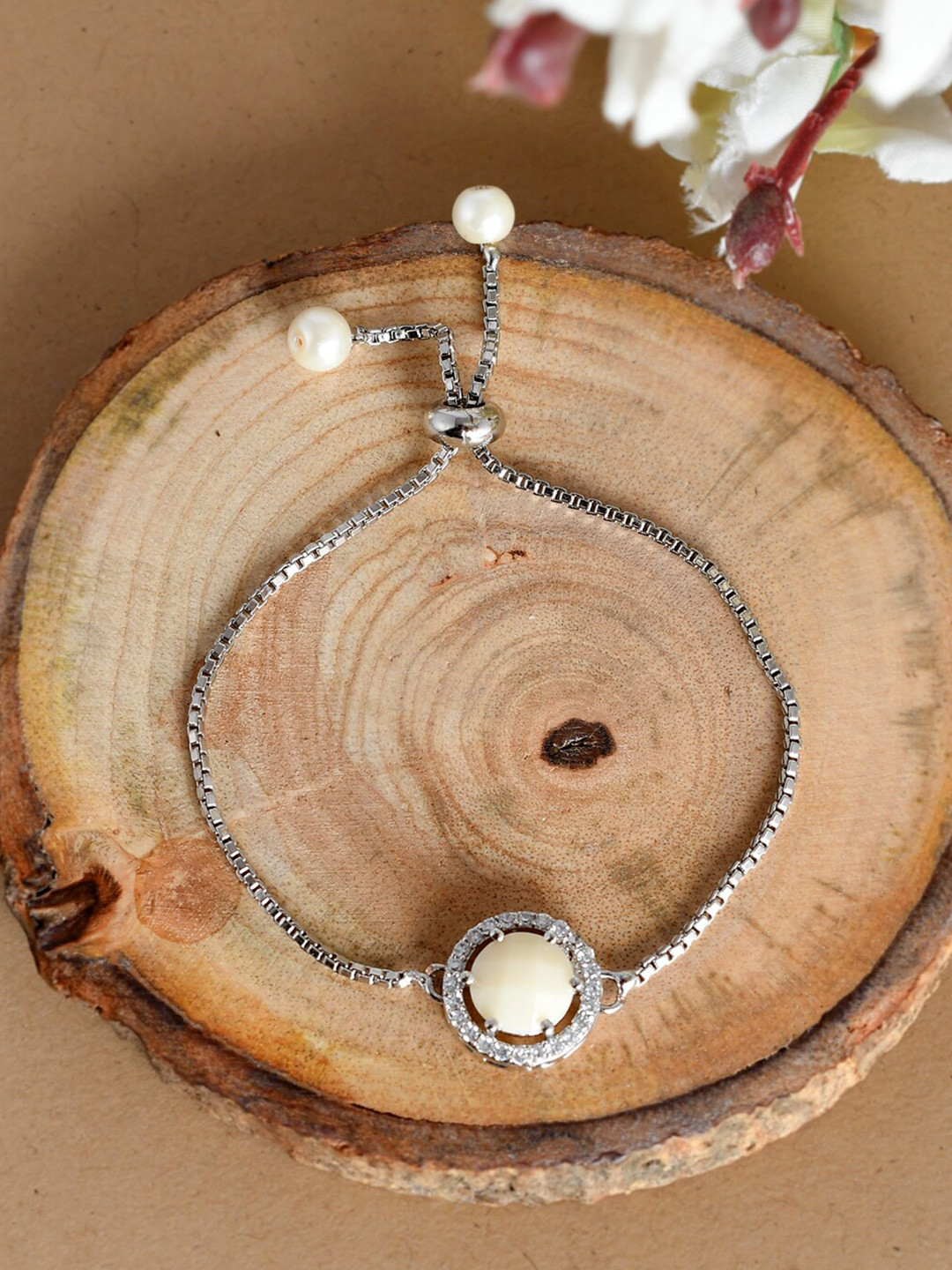 

Silvermerc Designs Women Silver & Cream-Coloured Brass American Diamond Zodiac Bracelet