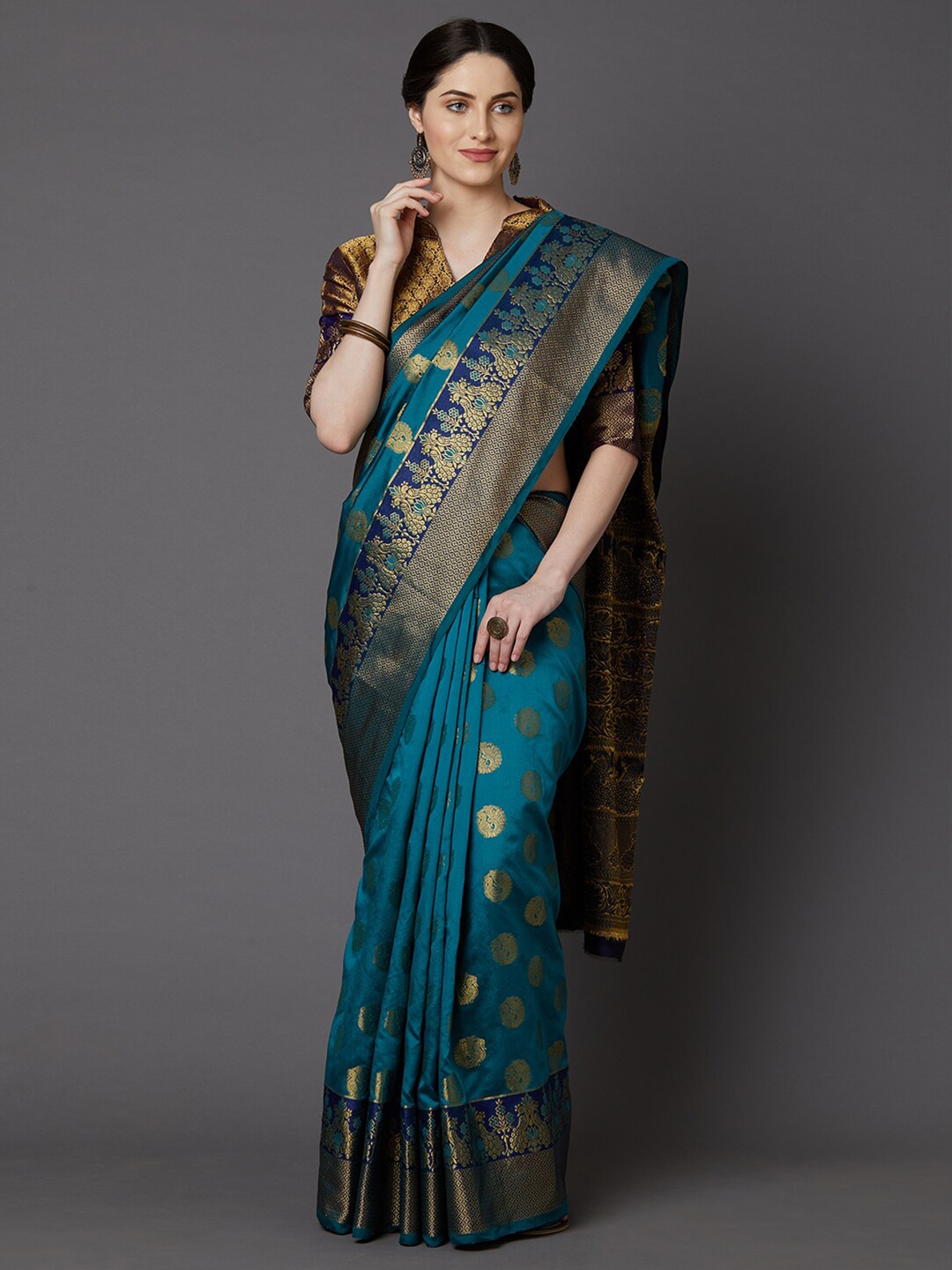 

Saree mall Teal & Gold-Toned Ethnic Motifs Zari Silk Blend Banarasi Sarees