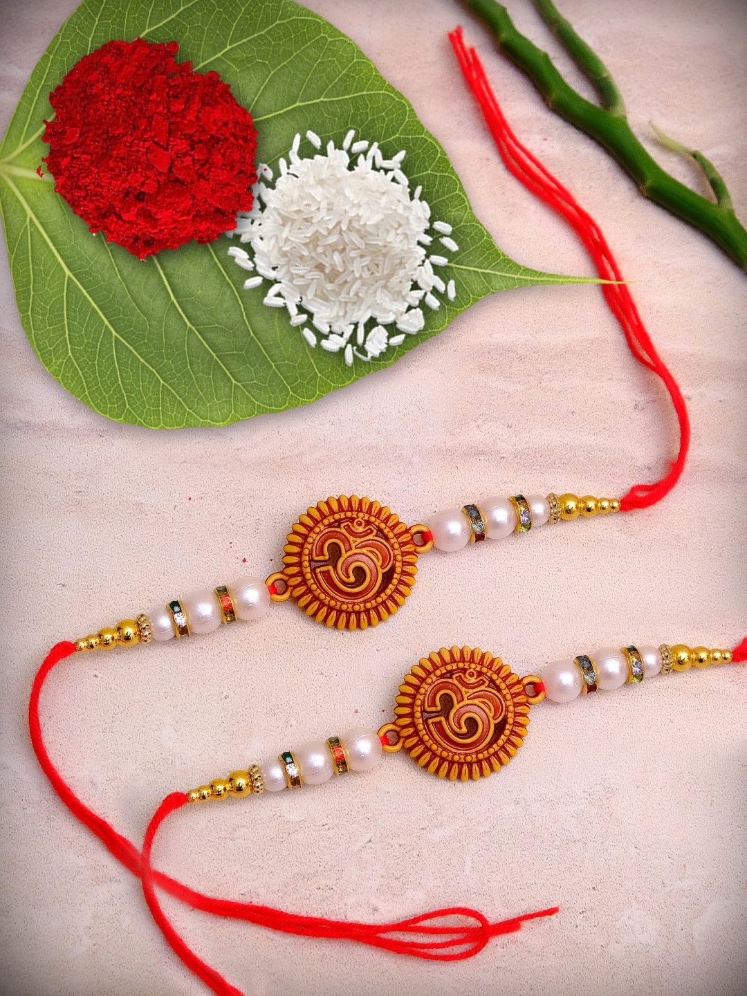 

Crunchy Fashion Pack Of 2 Brown Traditional Wood Om Rakhi With Roli & Chawal