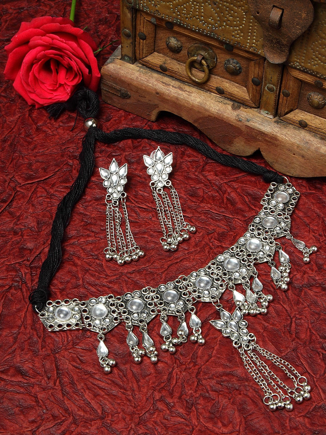 

Moedbuille Silver-Plated & White Stone-Studded Tasselled Handcrafted Aghan Jewellery Set