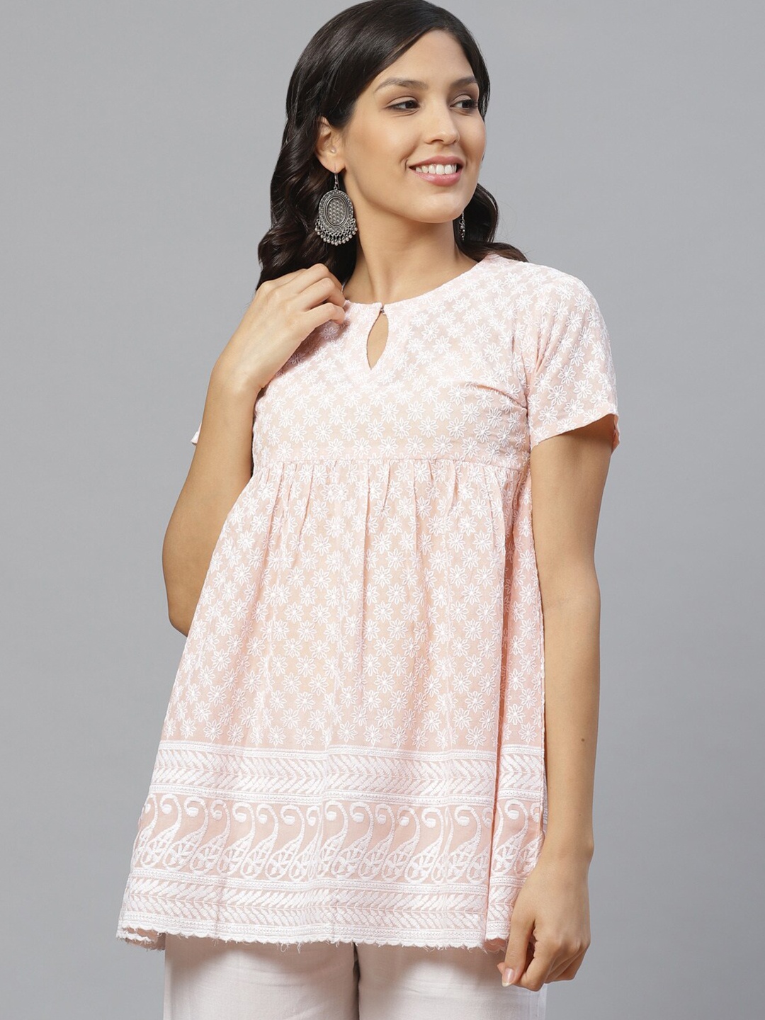 

Libas Peach & White Floral Embroidered Pure Cotton Kurti