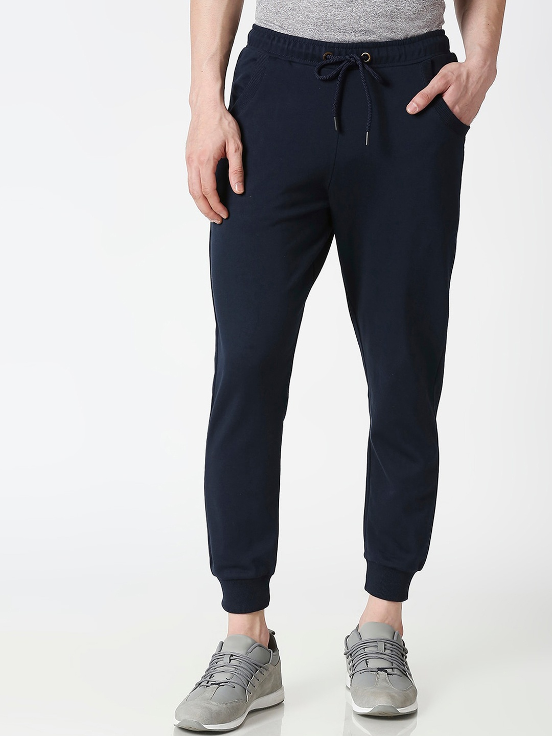 

Bewakoof Men Cotton Blend Navy Blue Solid Straight Fit Joggers