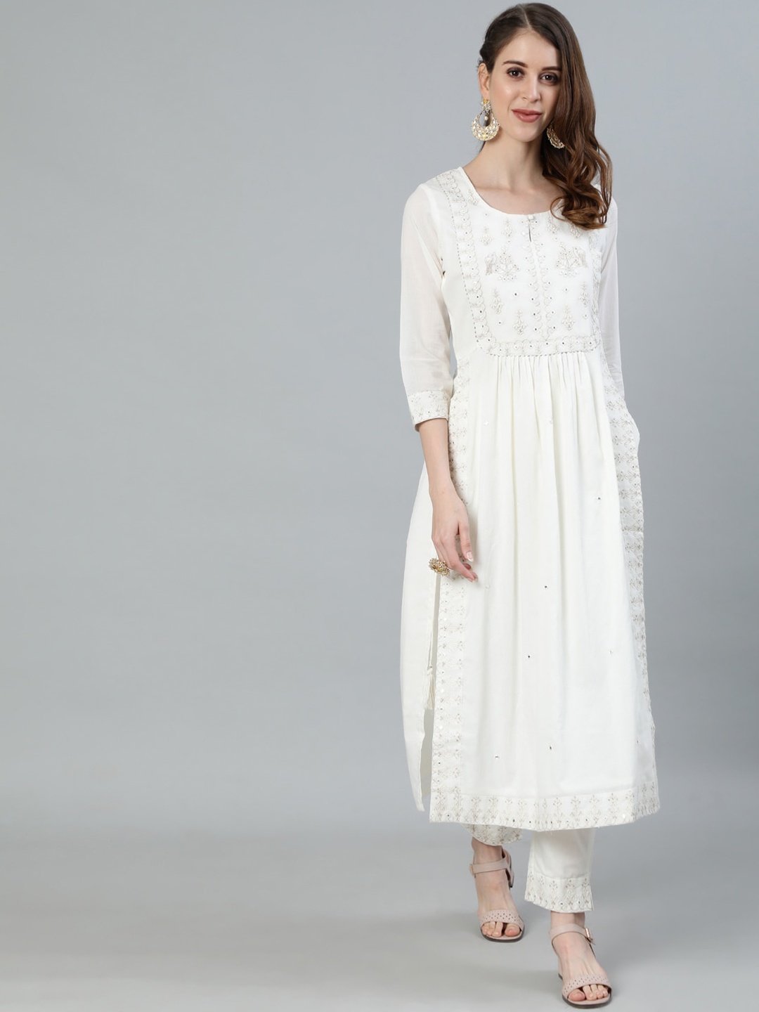 

Ishin Women Off White Ethnic Motifs Embroidered Pure Cotton Kurta with Trousers
