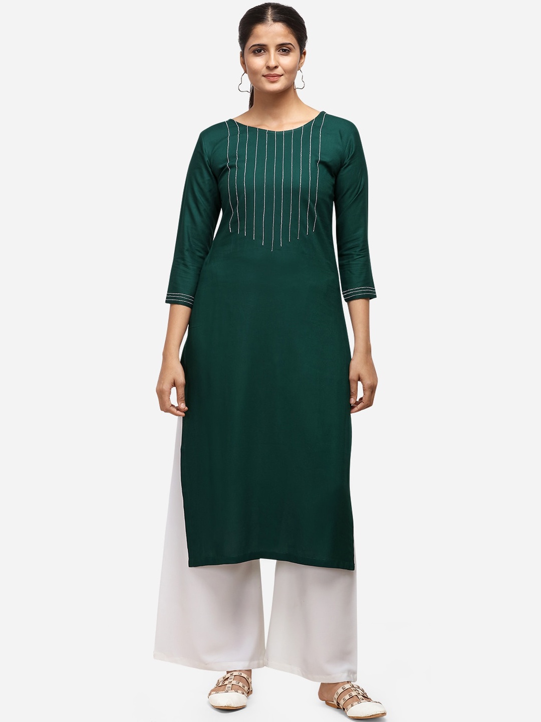 

SAADHVI Women Green Embroidered Kurta with Palazzos