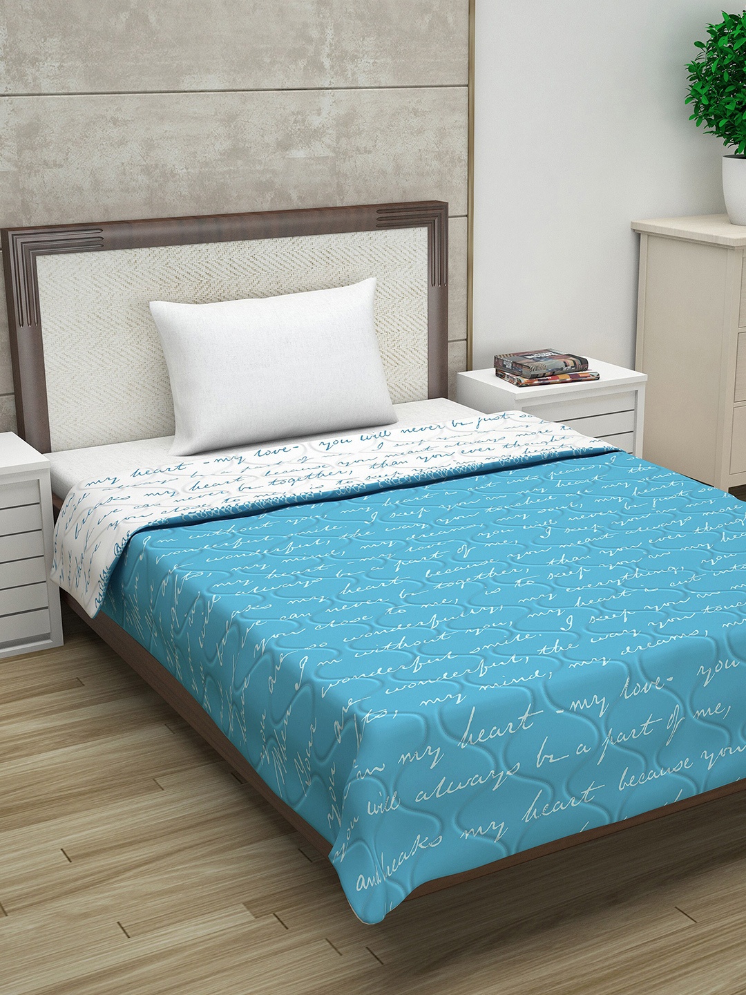

Divine Casa Blue & White Geometric AC Room 110 GSM Single Bed Comforter