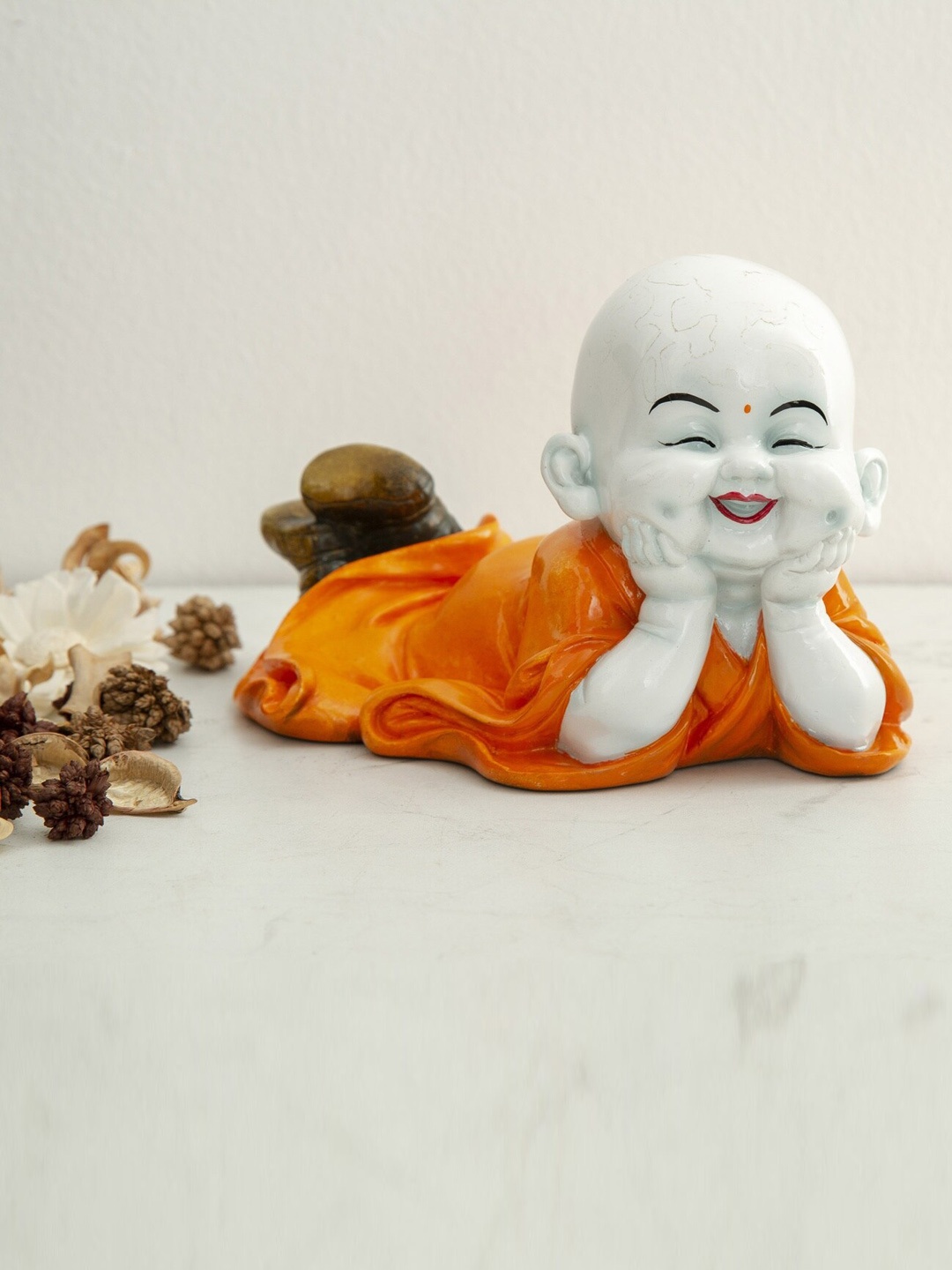 

Home Centre White & Orange Corsica Monk Figurine