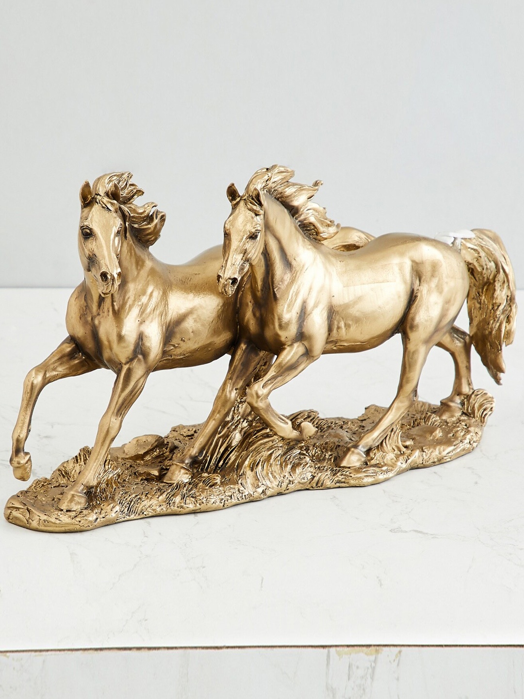 

Home Centre Gold-Toned Jaguar Running Horse Pair Figurine Showpiece