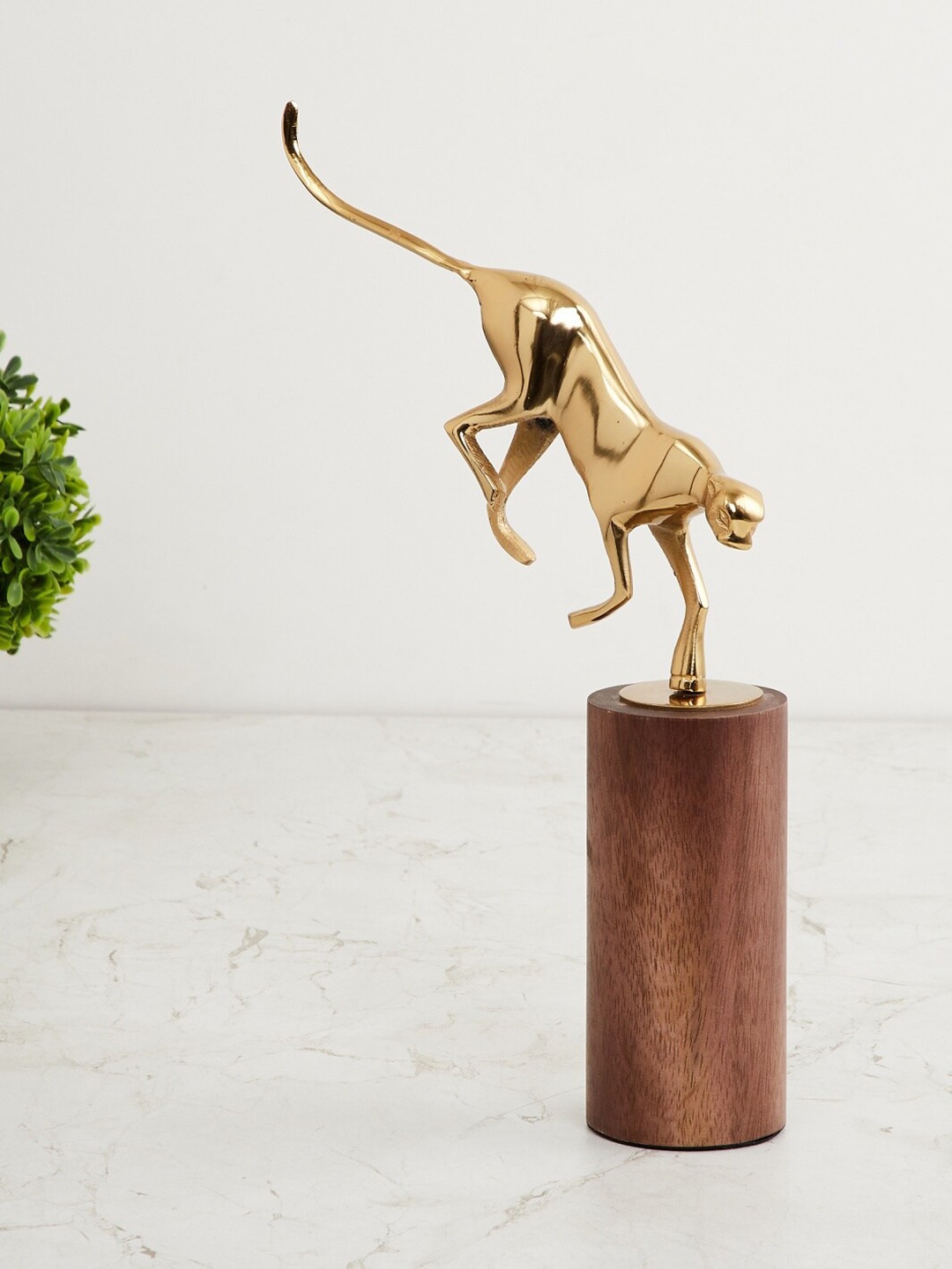 

Home Centre Gold-Toned & Brown Fiesta Metal Panther Figurine On Wood Block