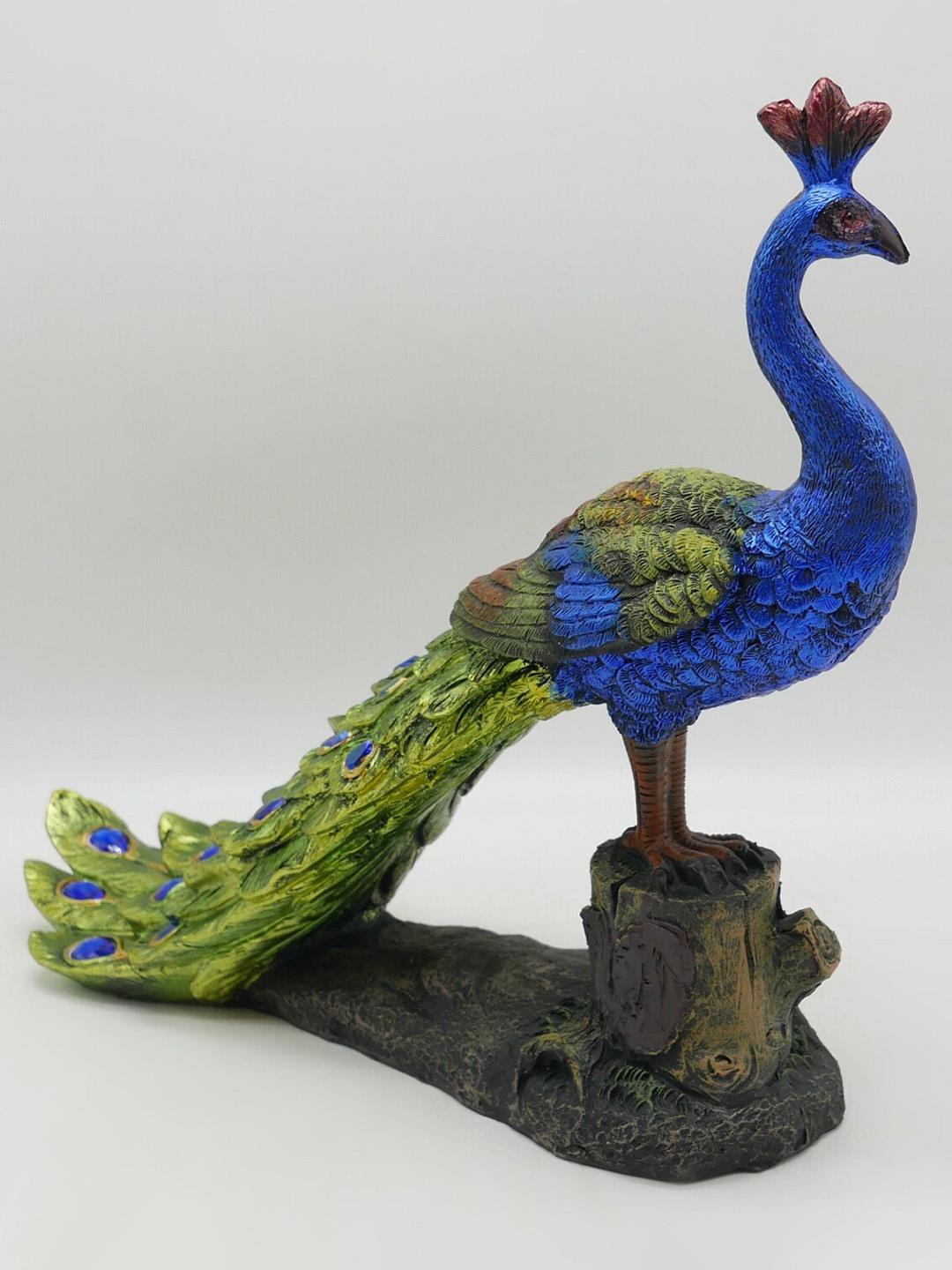 

Home Centre Blue & Green Corsica Stone Encrusted Peacock Figurine Showpiece