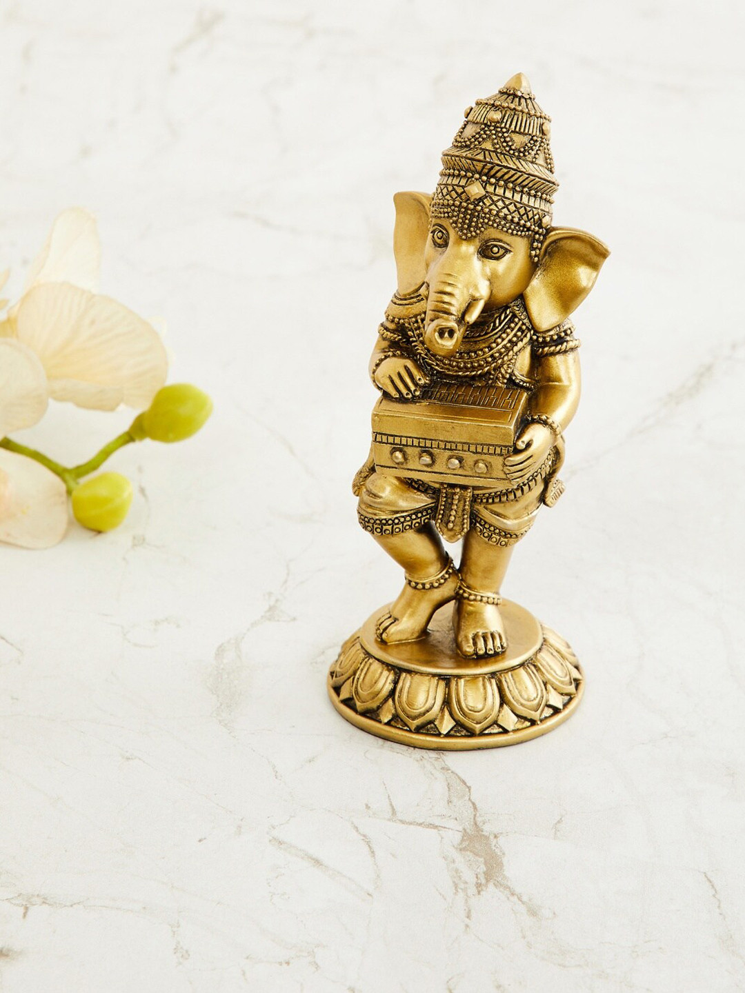 

Home Centre Gold-Toned Tranquil Ganesha Figurine With Harmonium Ceramic Showpiece