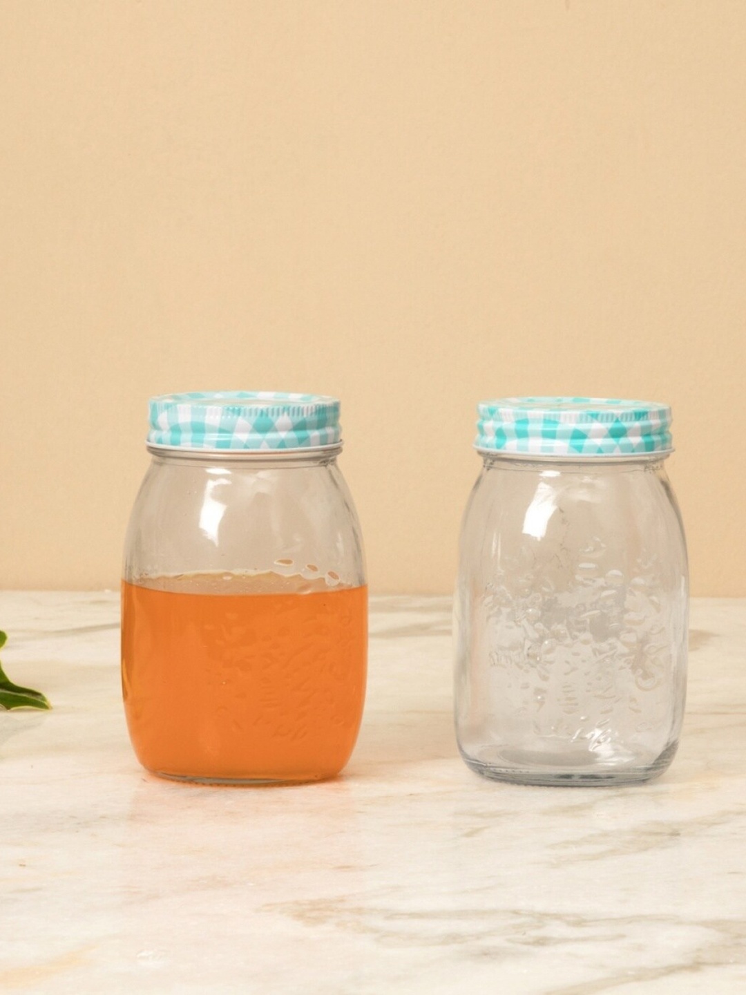 

Home Centre Set Of 2 Transparent & Blue Peroni-Cuba Glass Jars