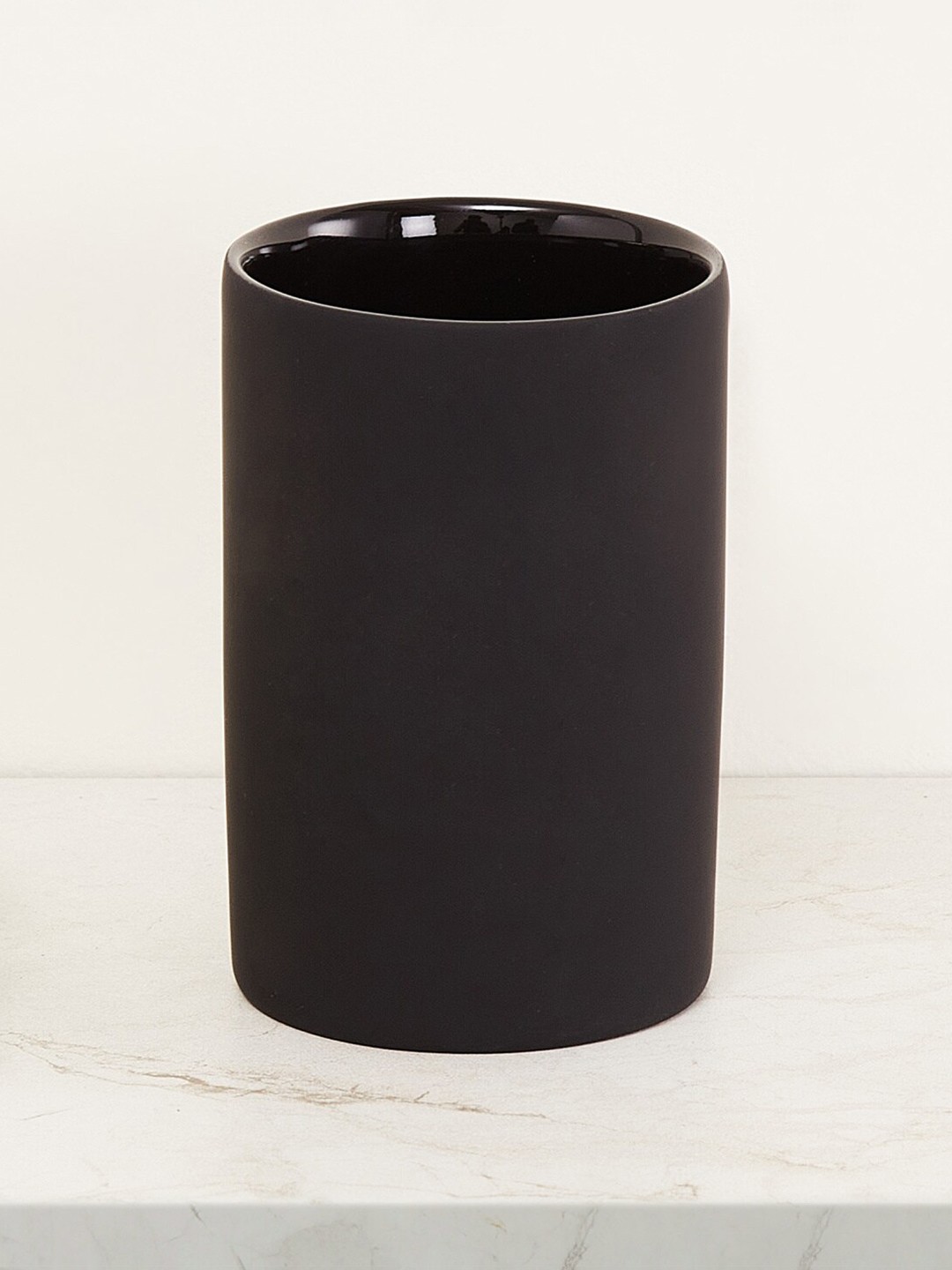 

Home Centre Black Solid Ceramic Glossy Toothbrush Holder