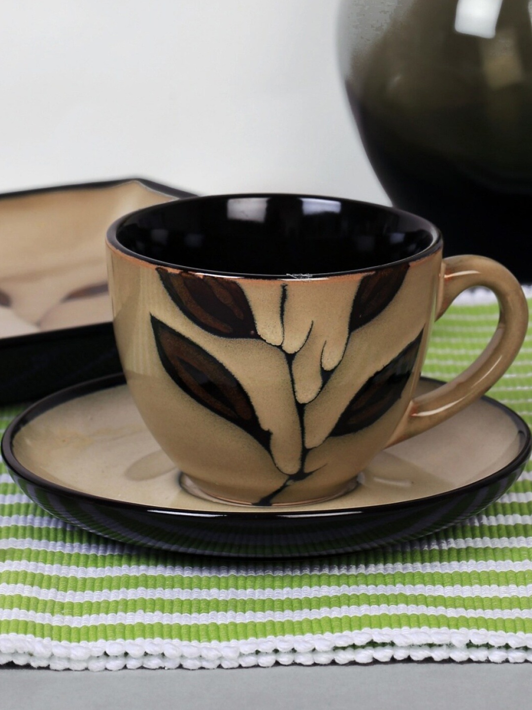 

Home Centre Beige & Black Printed Stoneware Cup & Saucer