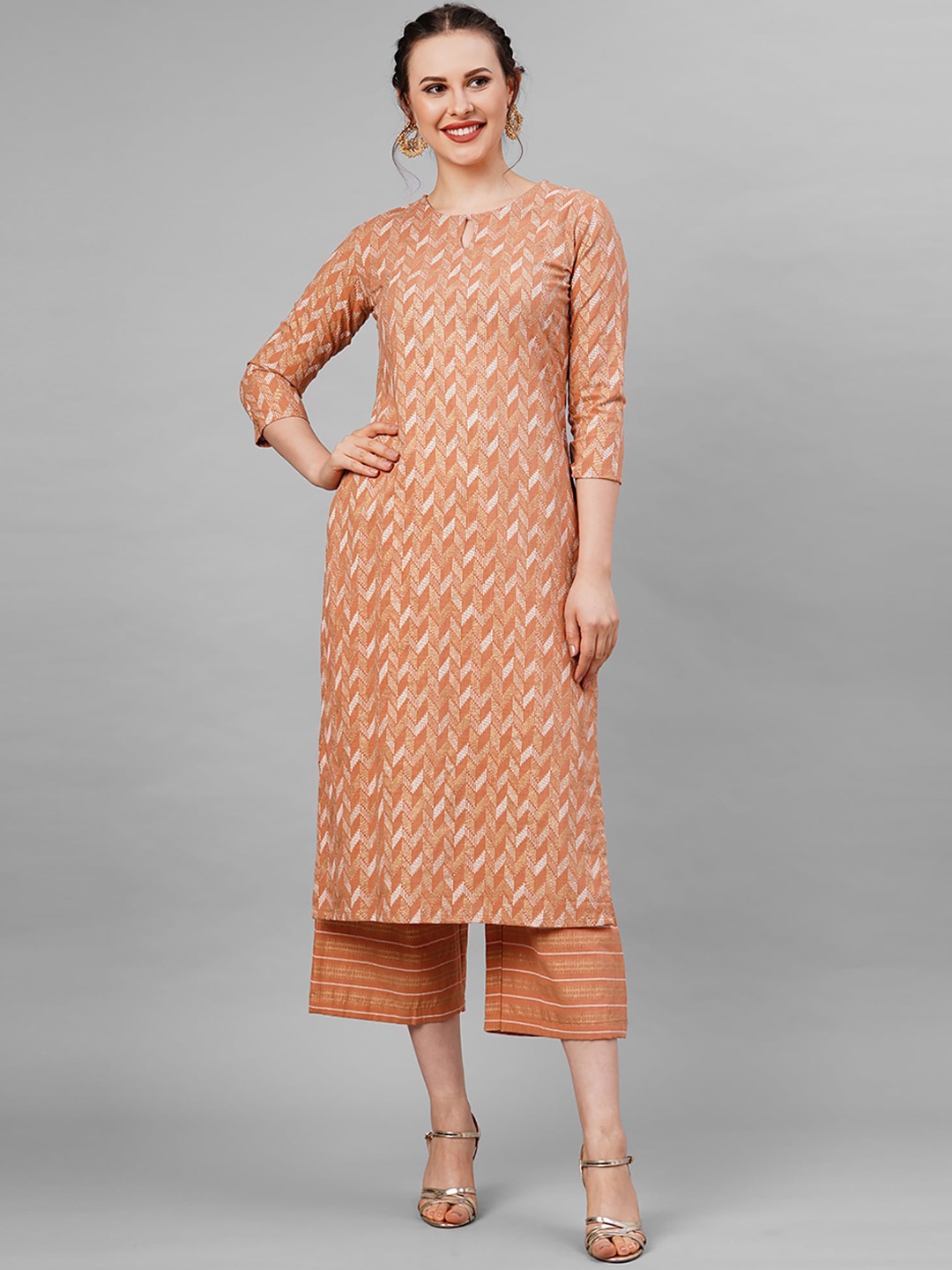 

Indo Era Women Rust Printed Kurta with Trousers