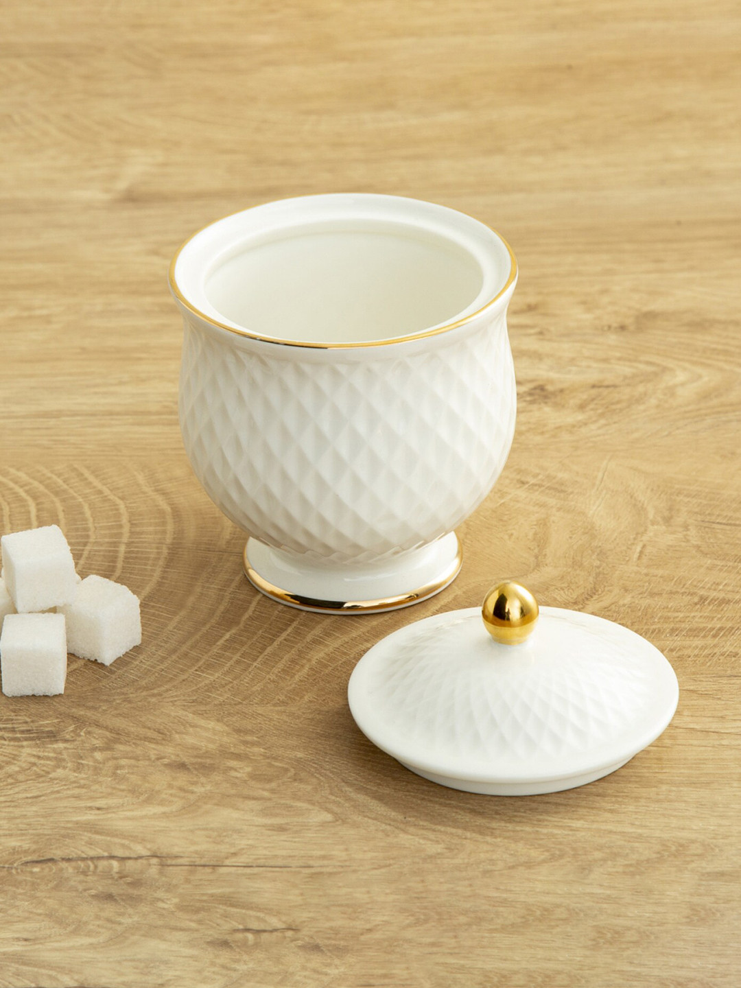 

Home Centre White Textured Ceramic Glossy Sugar Pot