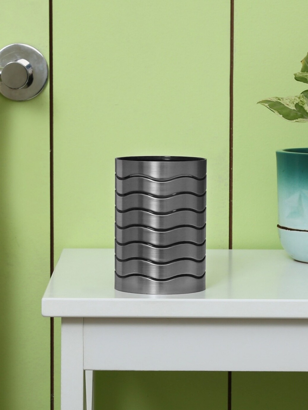 

Home Centre Silver Striped Porcelain Glossy Tumbler